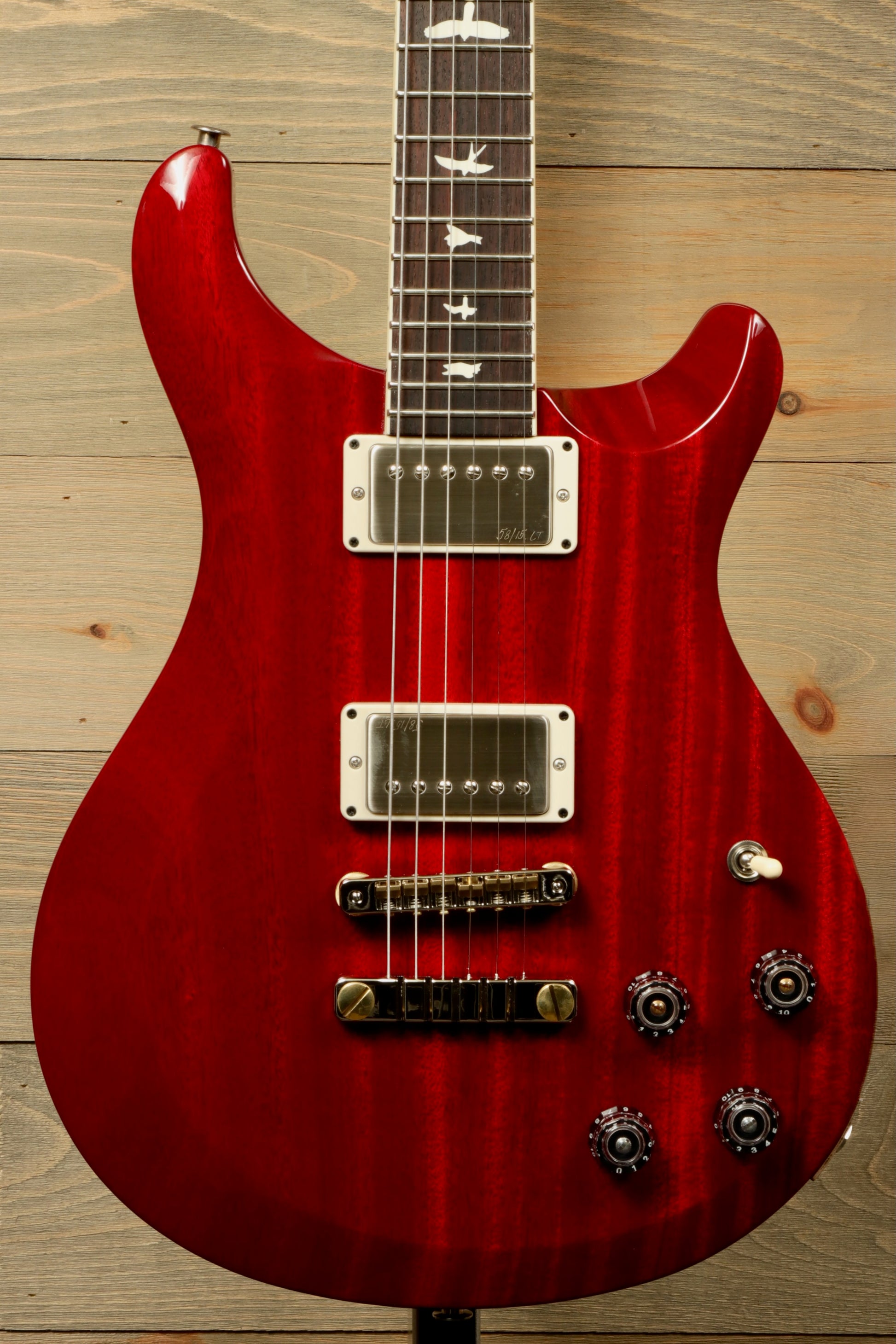 PRS 594 McCarty Electric Guitar in Red with Mahogany Body and Elegant Inlays