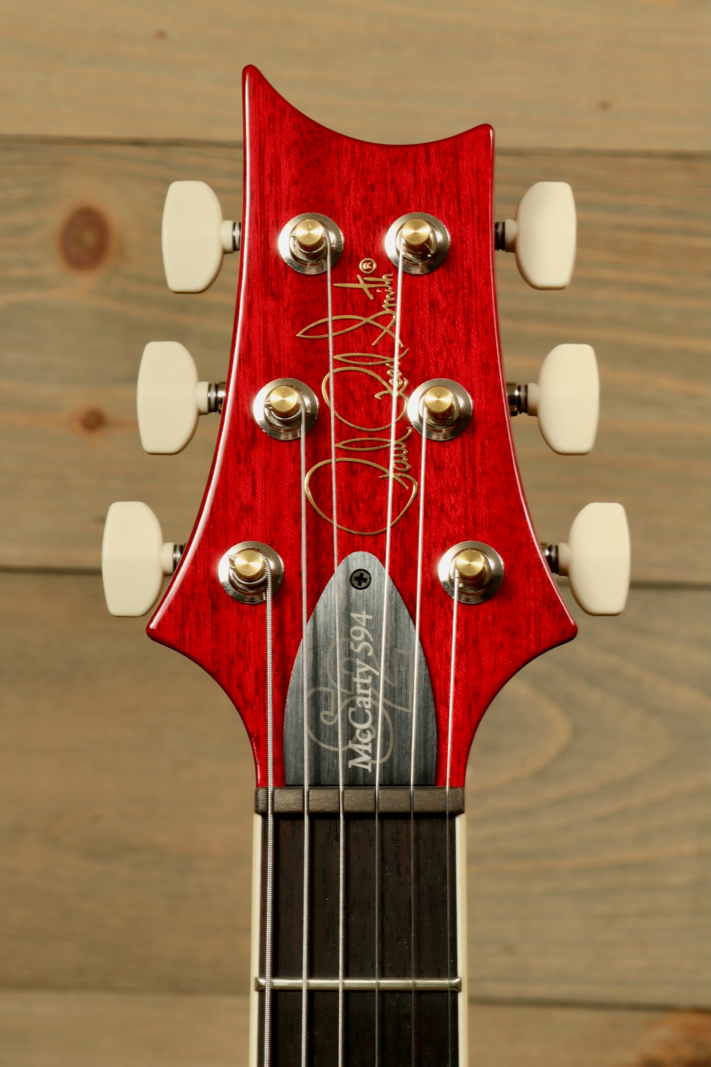 PRS 594 McCarty Electric Guitar Headstock with Signature and White Tuning Pegs