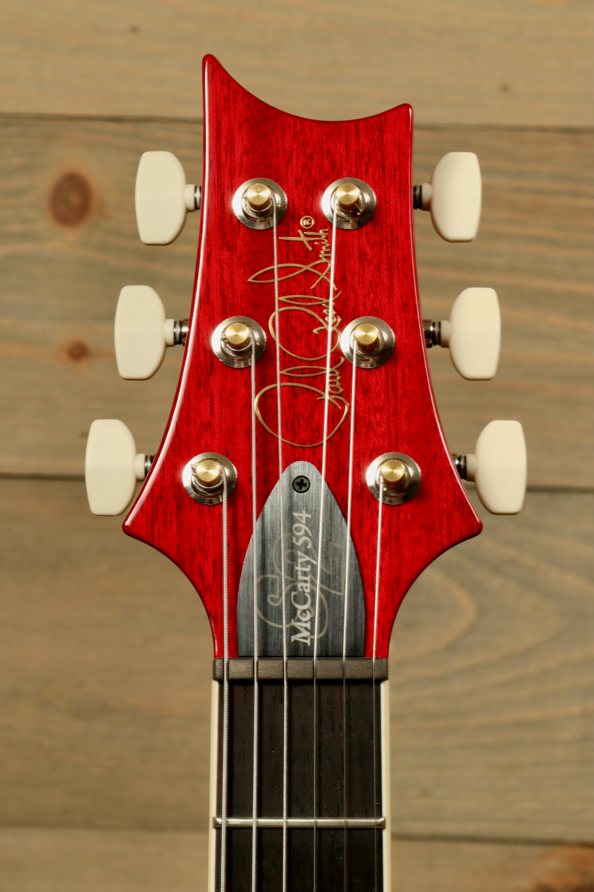 PRS 594 McCarty Electric Guitar Headstock with Signature and White Tuning Pegs