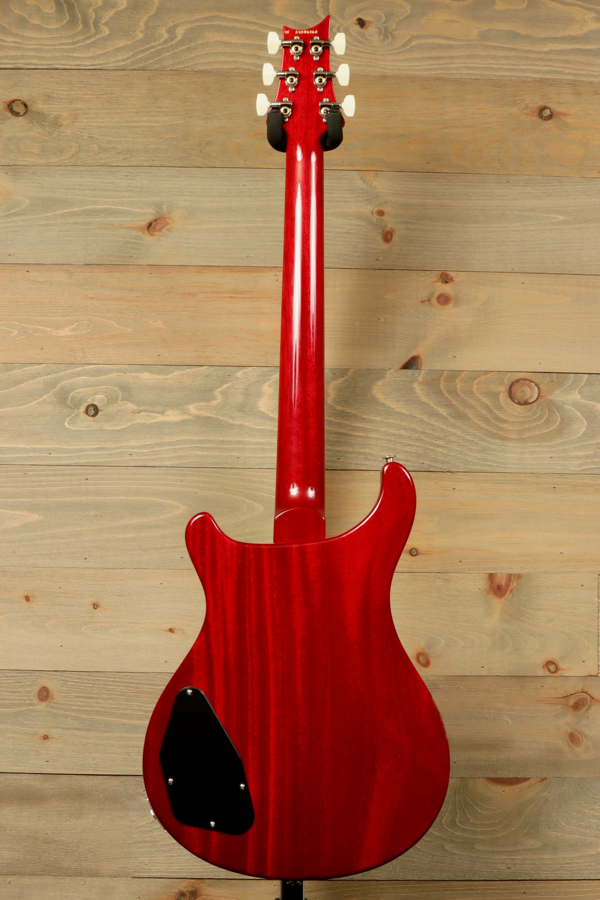 Back view of PRS 594 McCarty electric guitar in a stunning red finish