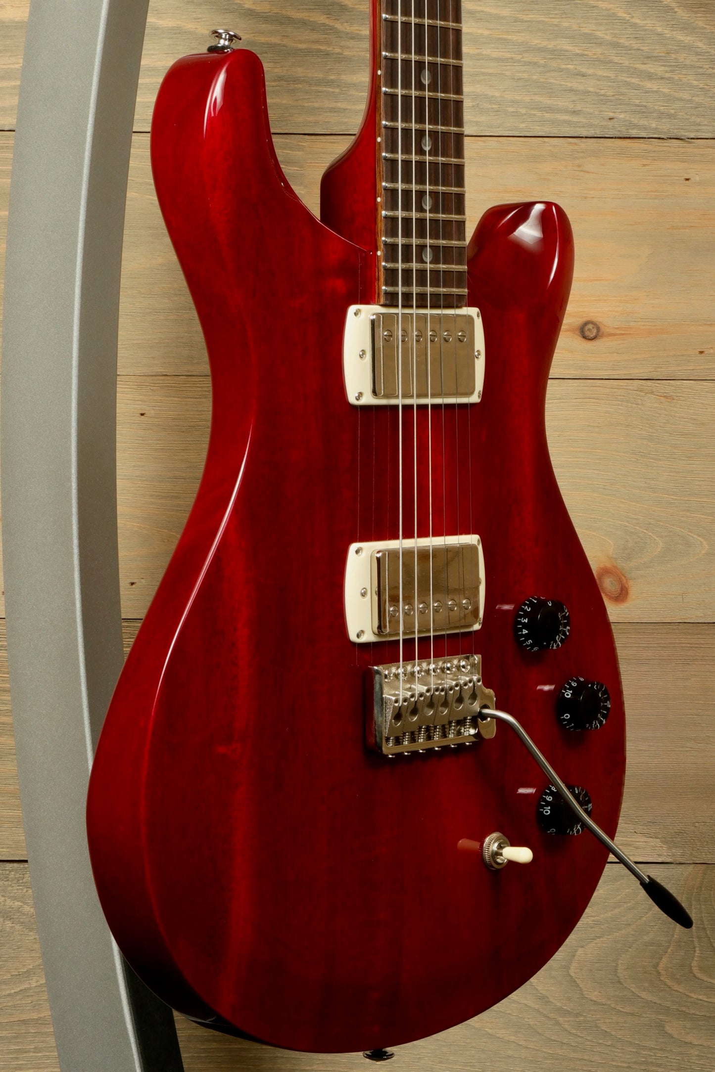 PRS SE DGT Standard guitar in a rich red finish with chrome hardware and versatile controls