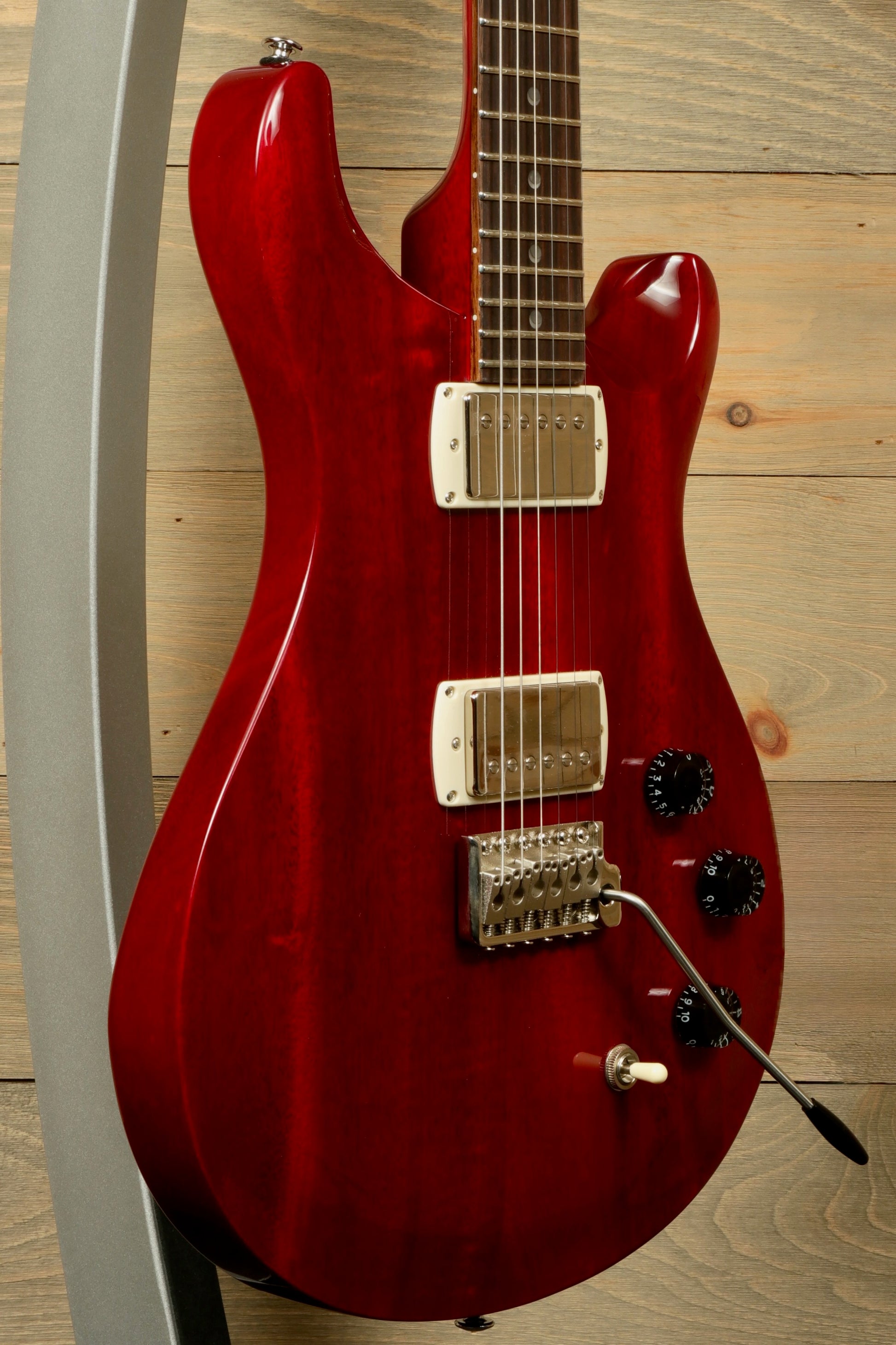 PRS SE DGT Standard guitar in a rich red finish with chrome hardware and versatile controls