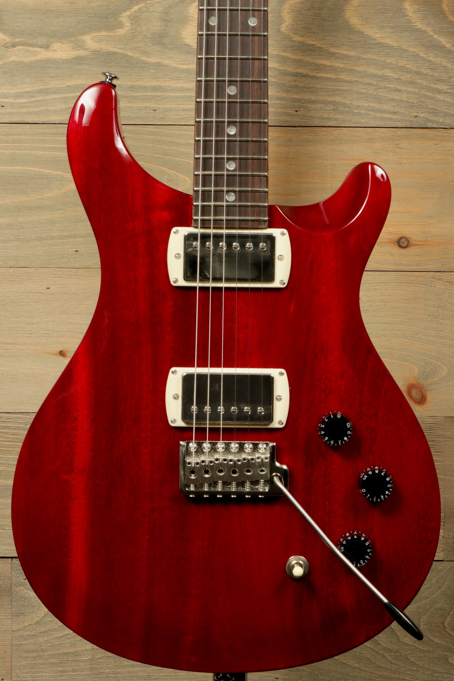 PRS SE DGT Standard guitar in red with double cutaway and humbucker pickups