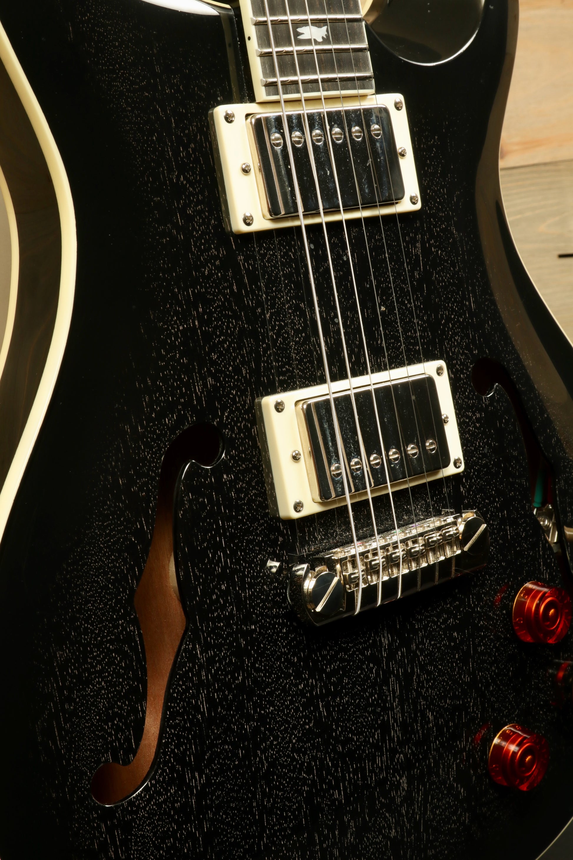 PRS SE Hollowbody Standard Piezo in Doghair finish, close-up view of the body and pickups