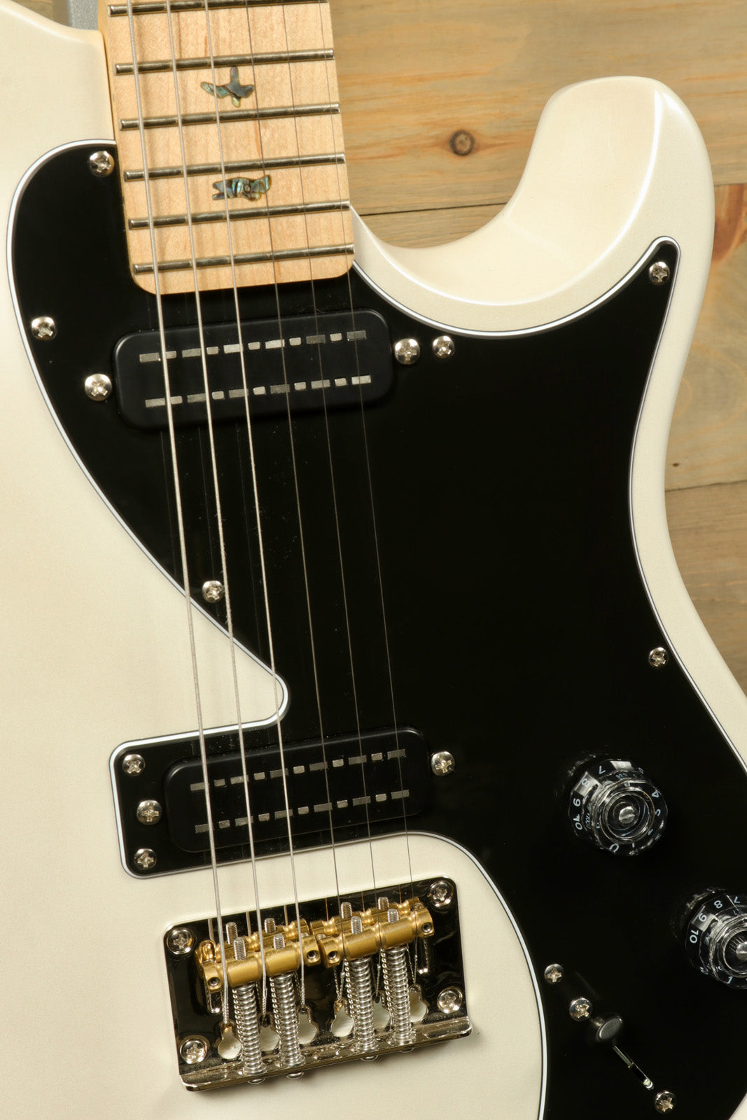 PRS SE NF53 white finish, front view showcasing the pickups and hardware details