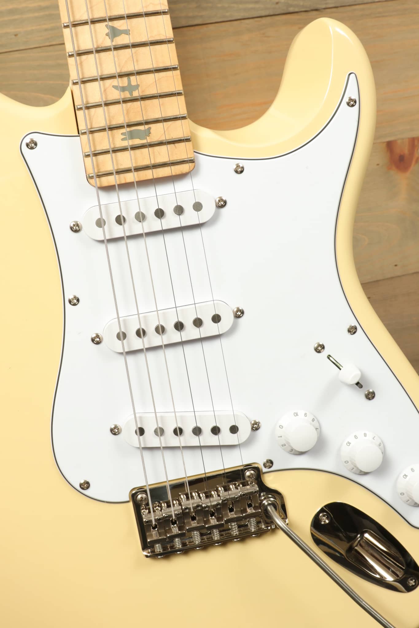 PRS SE Silver Sky - Moon White electric guitar with a sleek design and quality hardware