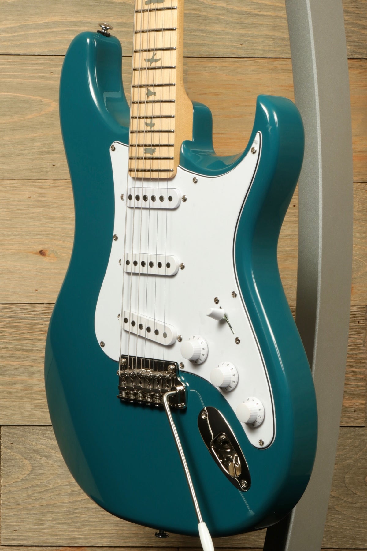 PRS SE Silver Sky - Nylon Blue Electric Guitar, front view with glossy finish and white pickguard