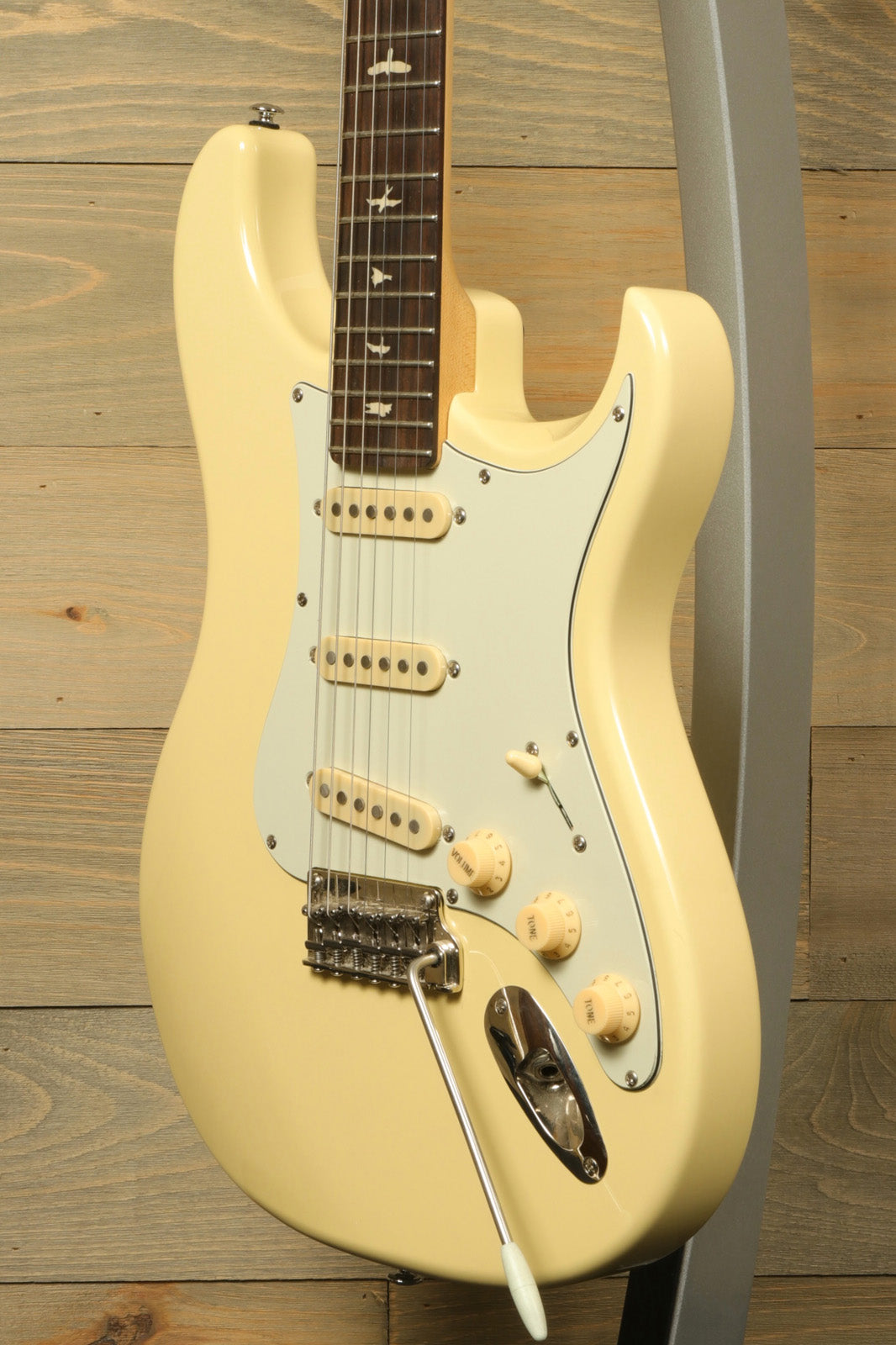 PRS SE Silver Sky in buttery yellow with a glossy finish, front view showcasing the body and pickups - USED