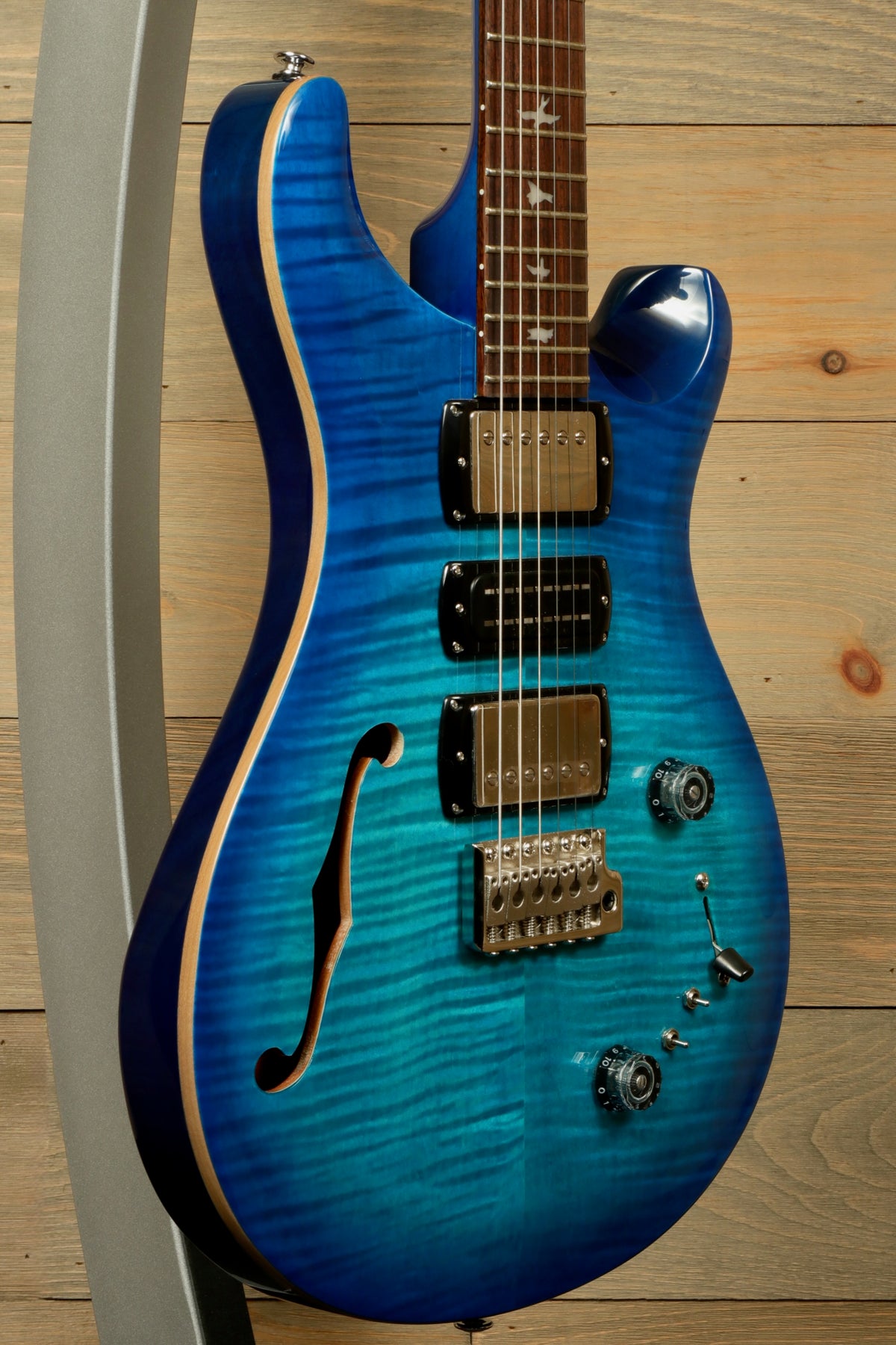 PRS SE Special Semi-Hollow electric guitar in blue burst finish, side view highlighting body shape