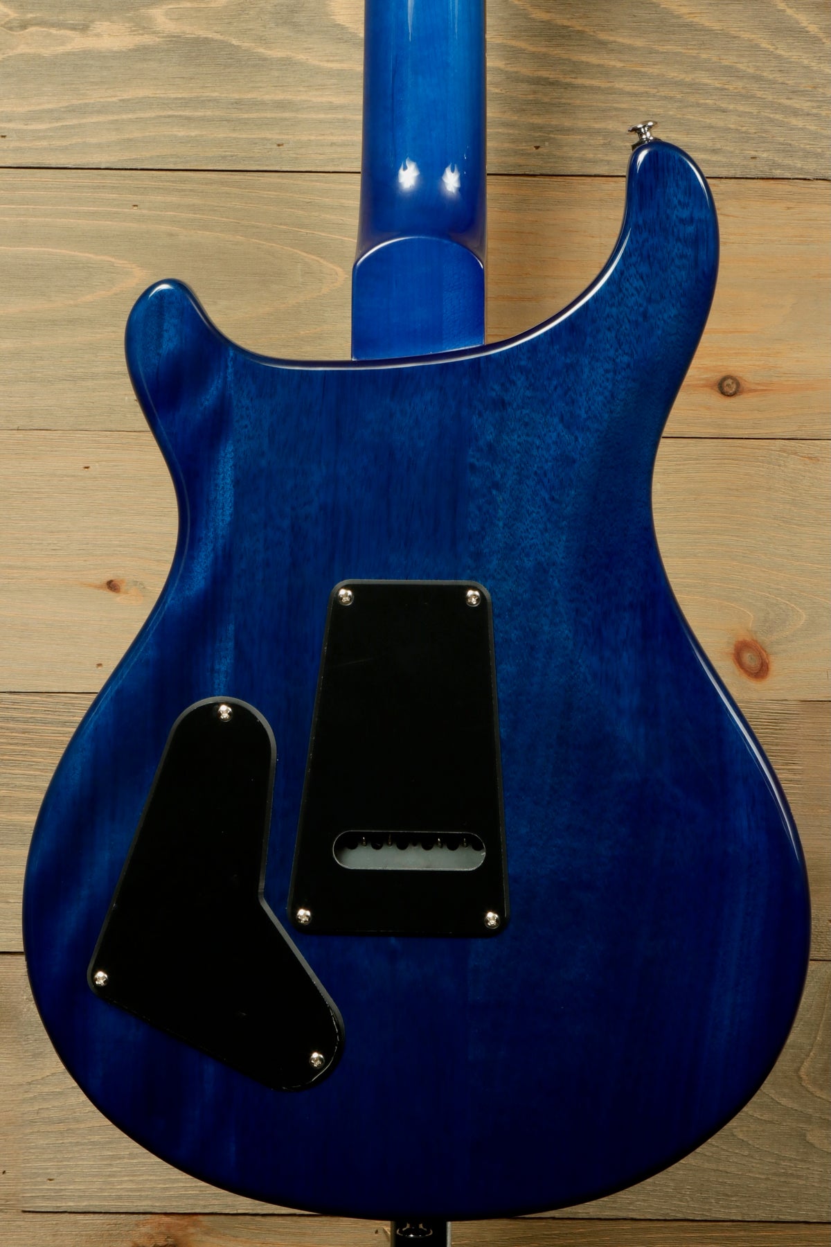 PRS SE Special Semi-Hollow blue finish, back view showing electronics and wood grain