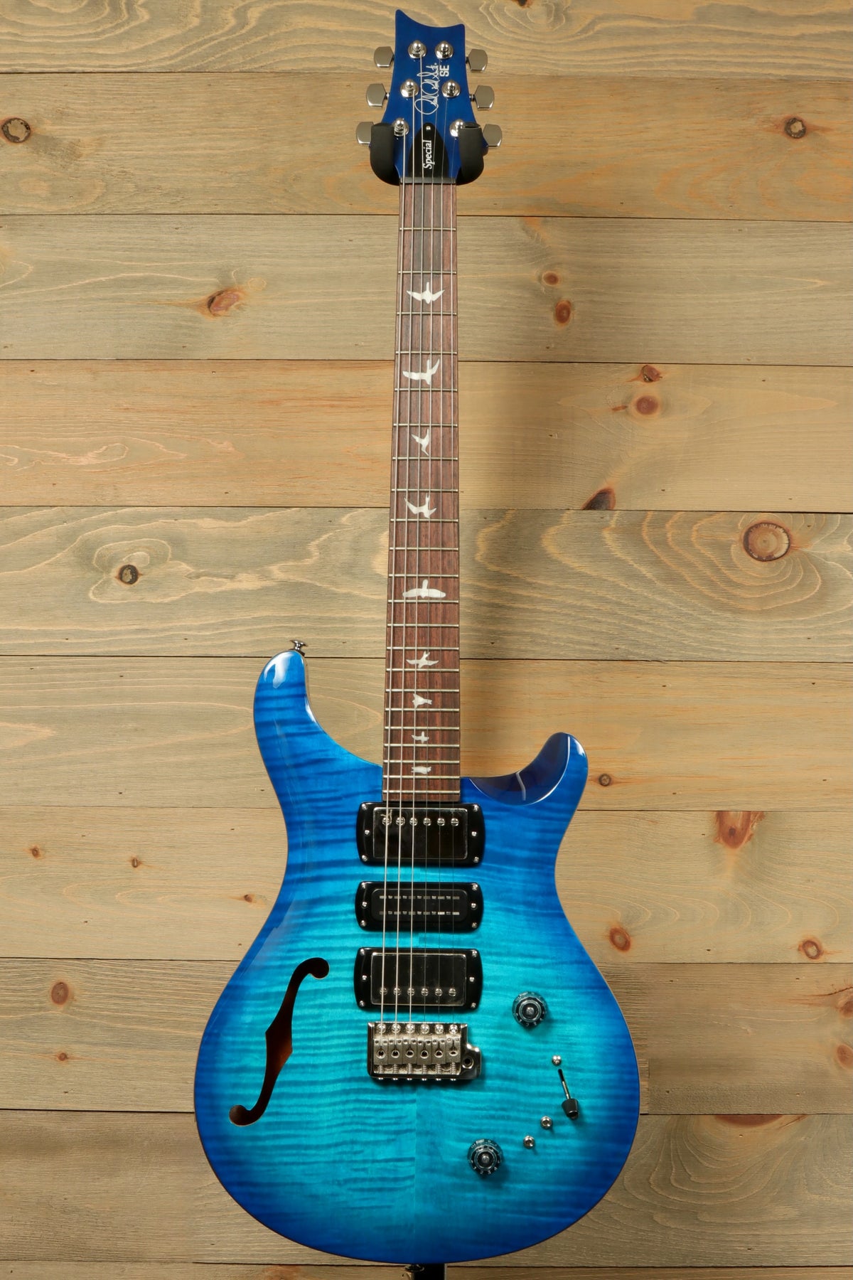 PRS SE Special Semi-Hollow electric guitar in vibrant blue, front view