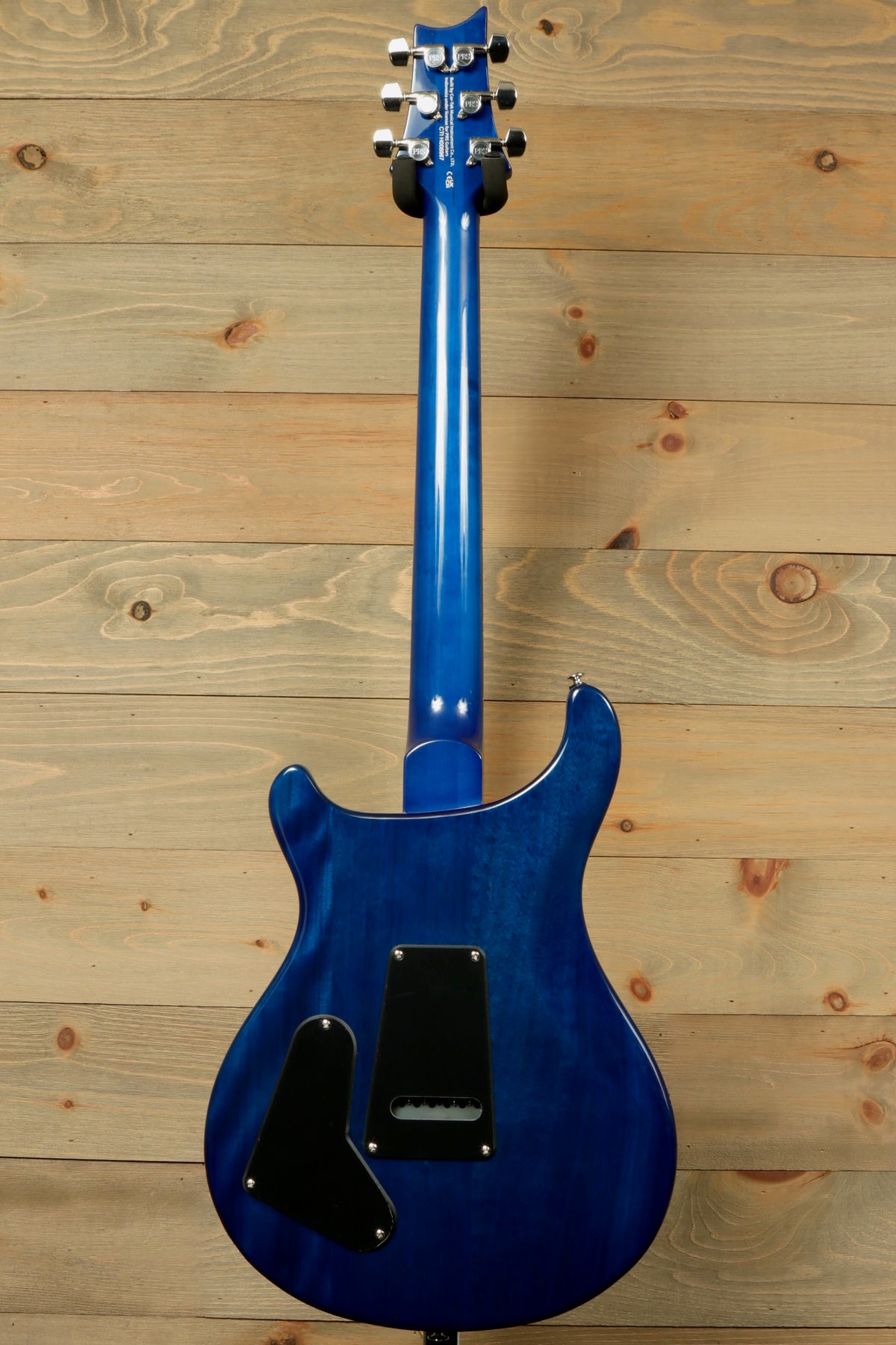 PRS SE Special Semi-Hollow electric guitar in blue, back view with stylish contours
