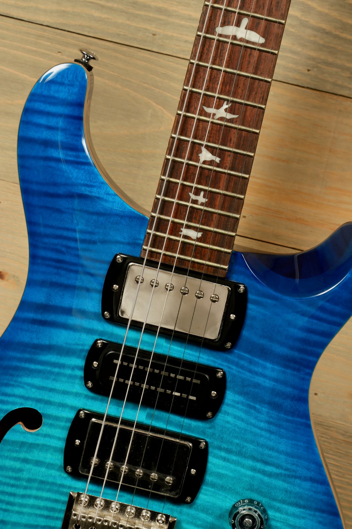 PRS SE Special Semi-Hollow electric guitar in blueburst, front view showing the neck and body details