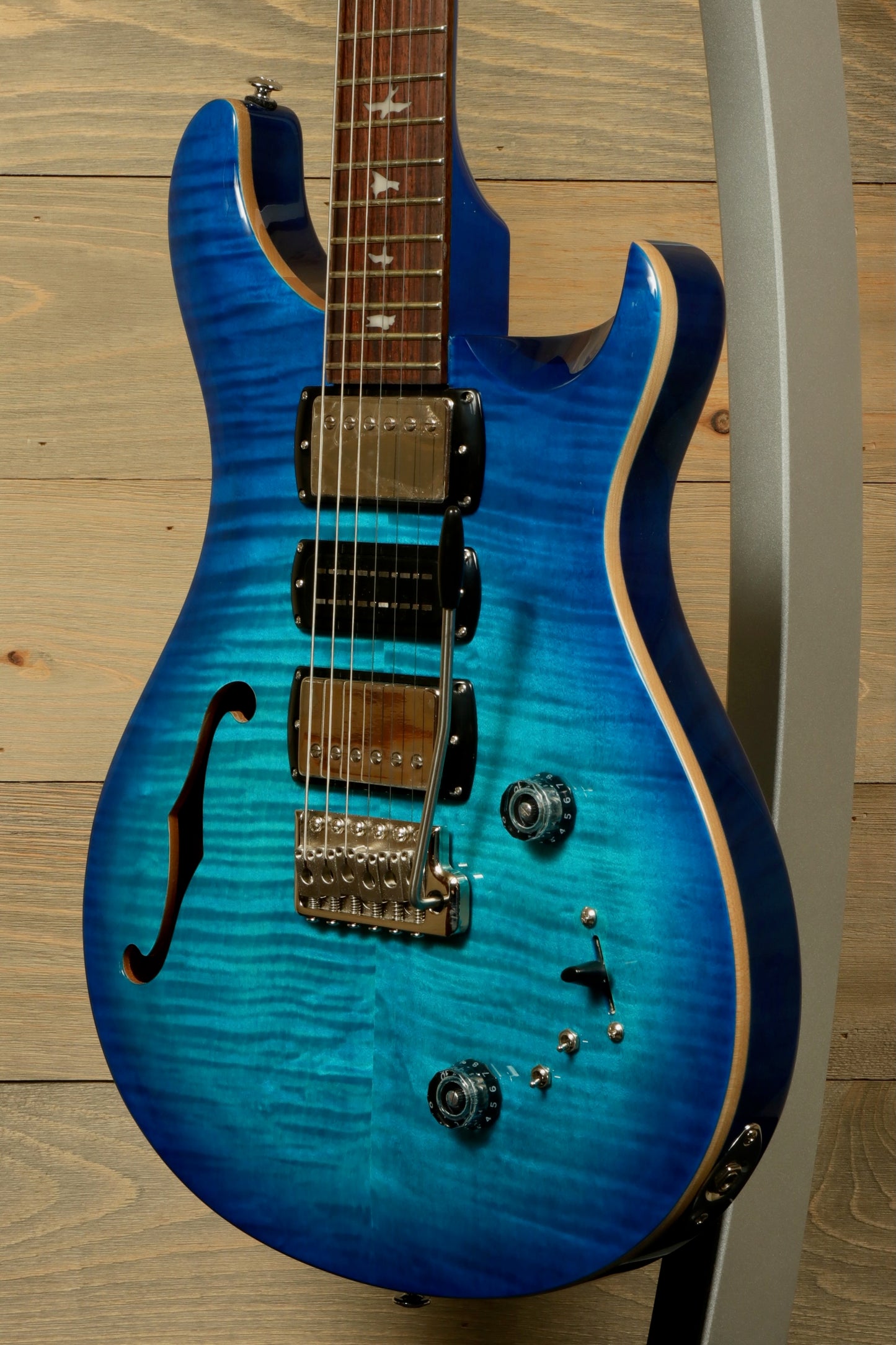 PRS SE Special Semi-Hollow electric guitar in blue with elegant finish and 3 pickups