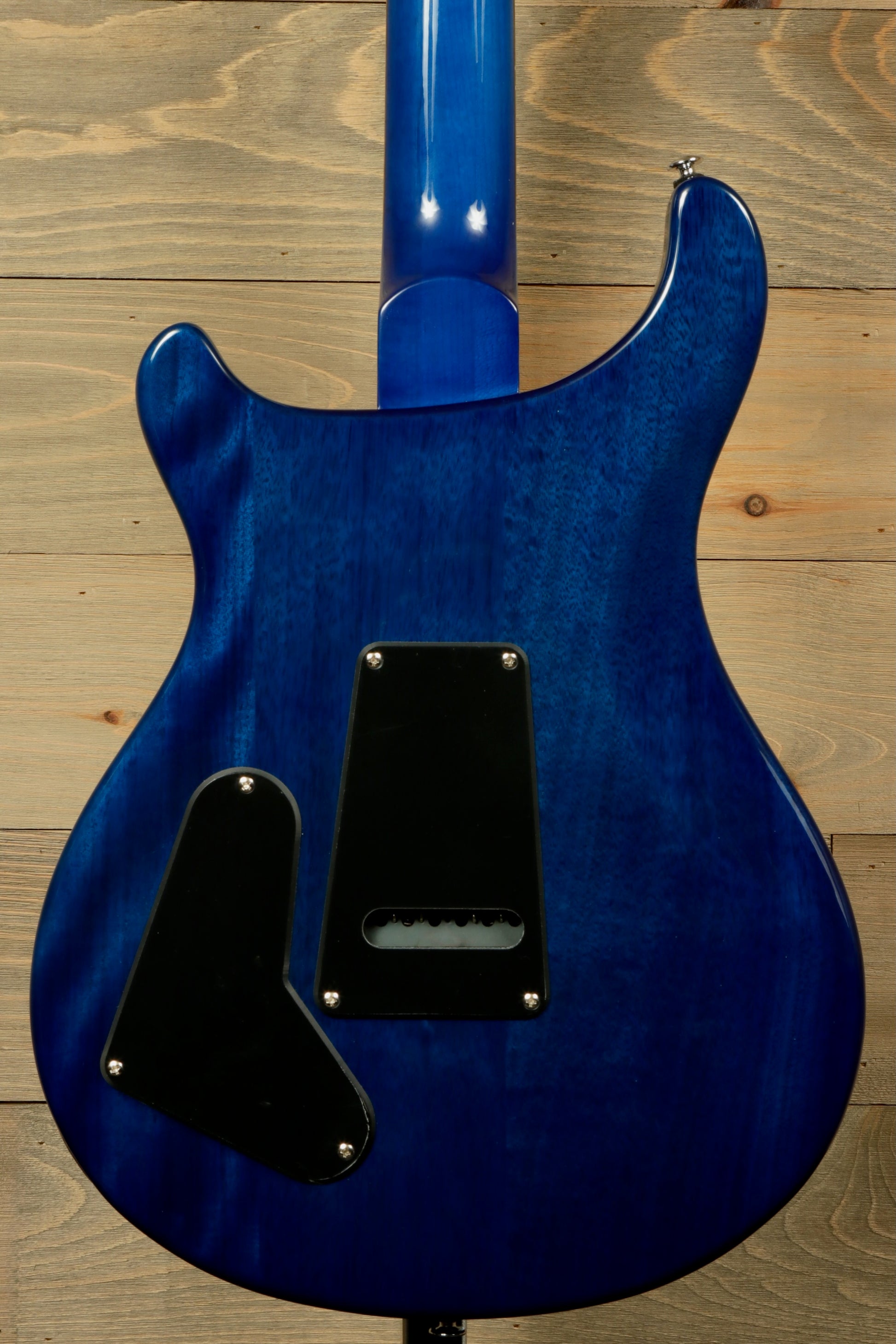 Back view of PRS SE Special Semi-Hollow electric guitar in blue finish highlighting its sleek design