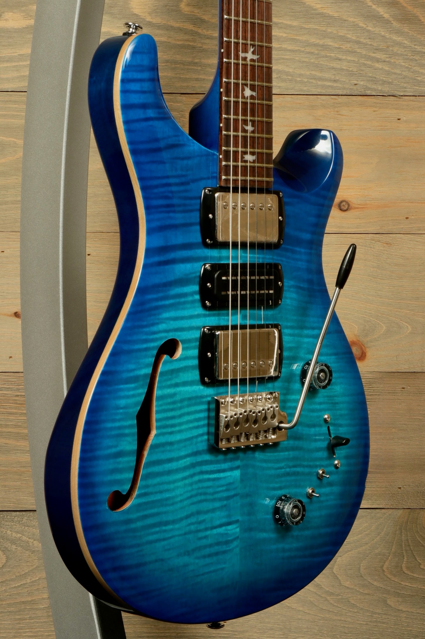 PRS SE Special Semi-Hollow electric guitar in a beautiful blue finish with stylish semihollow design