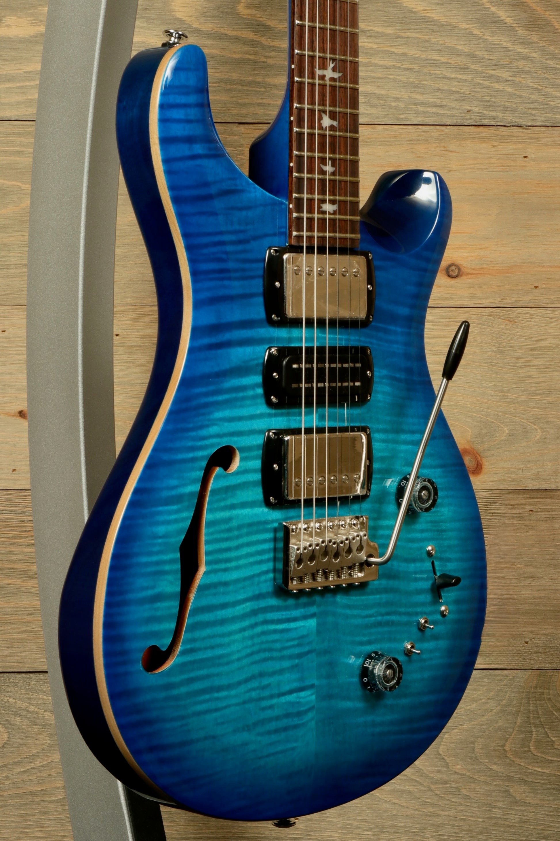 PRS SE Special Semi-Hollow electric guitar in a beautiful blue finish with stylish semihollow design