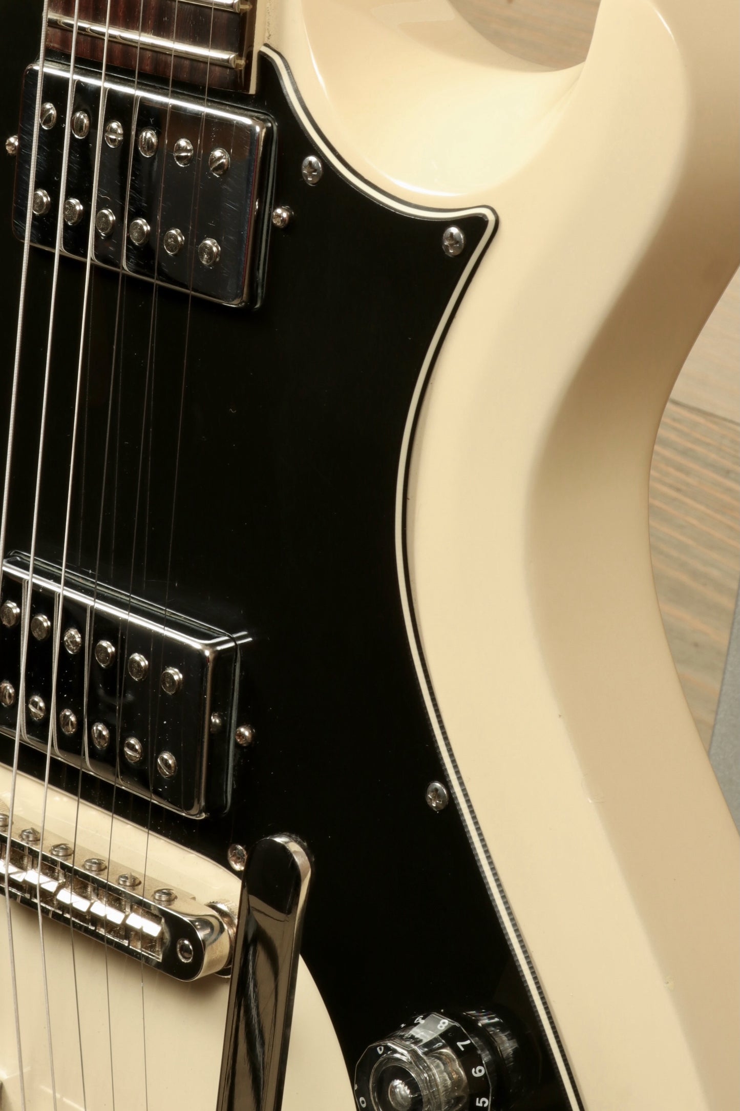 PRS Starla S2 in cream finish with black pickguard, close-up view of the body and controls
