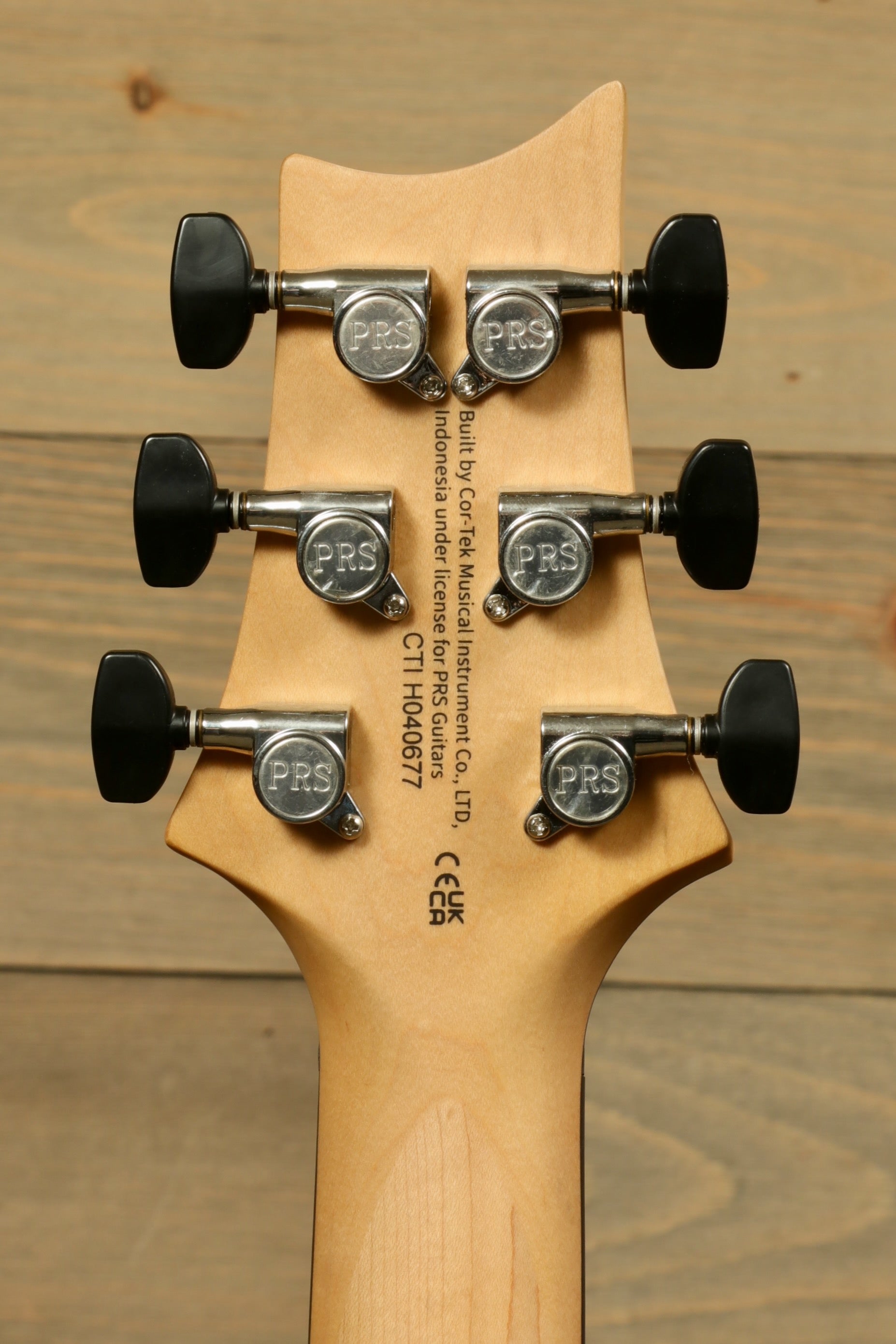 PRS Stop Tail guitar Metro East headstock with tuning pegs and logo details