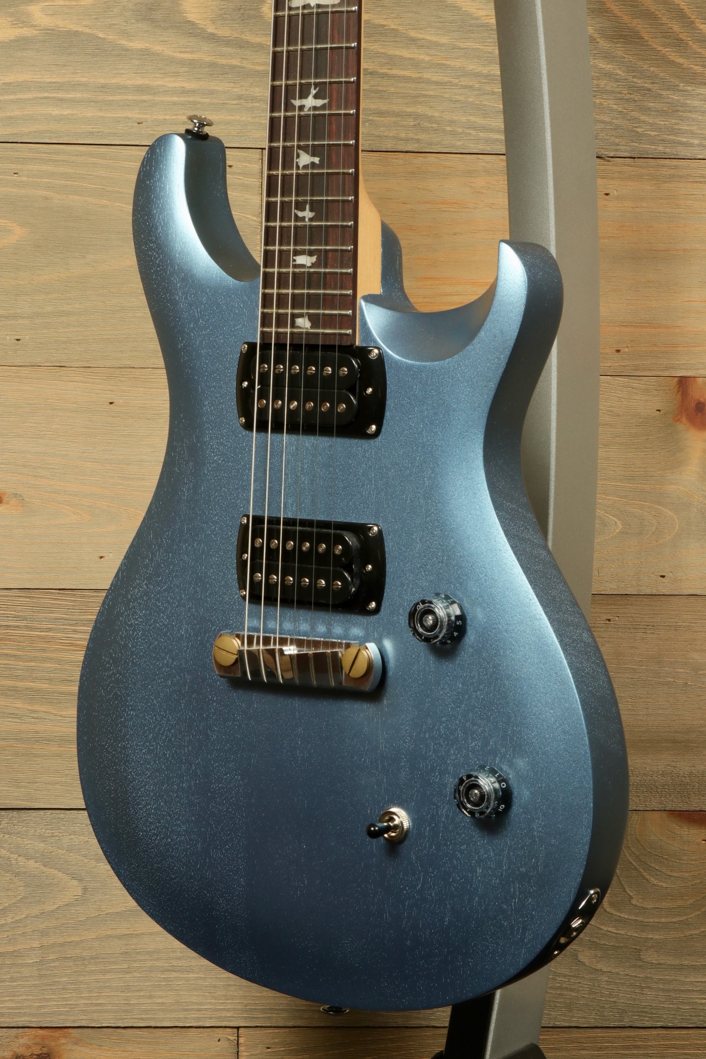 PRS Stop Tail guitar Metro East in metallic blue finish with sleek design and elegant details