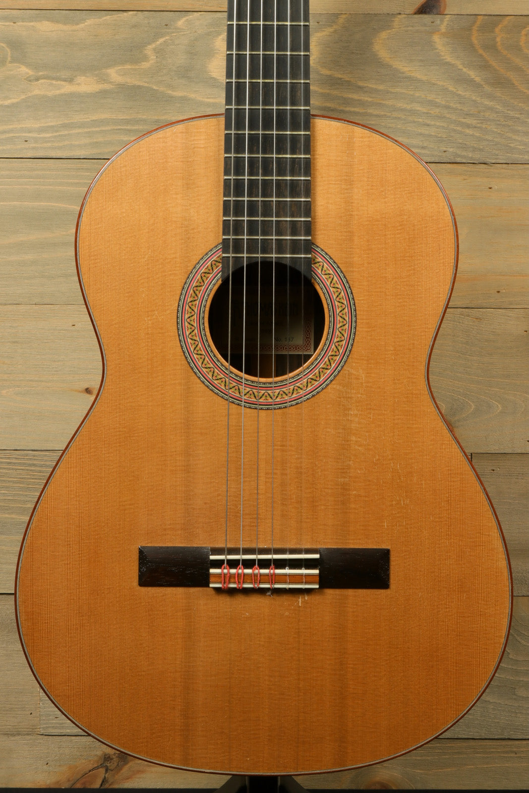 R. Thomas Rein Classical Concert Guitar in natural finish, front view showcasing the body and fretboard