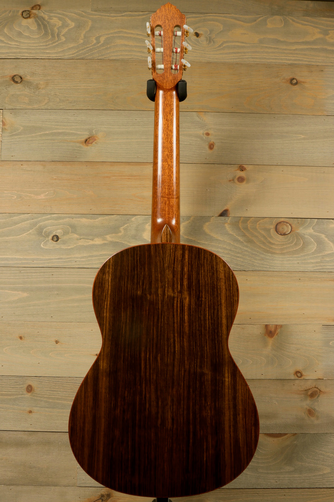 R. Thomas Rein Classical Concert Guitar with a natural wood finish, back view showcasing the elegant grain
