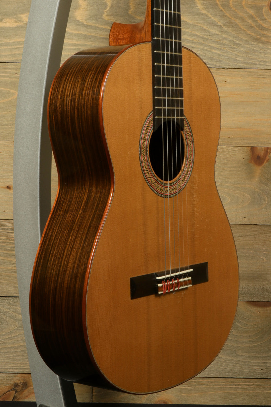 R. Thomas Rein Classical Concert Guitar, natural finish, side view, elegant design with detailed rosette