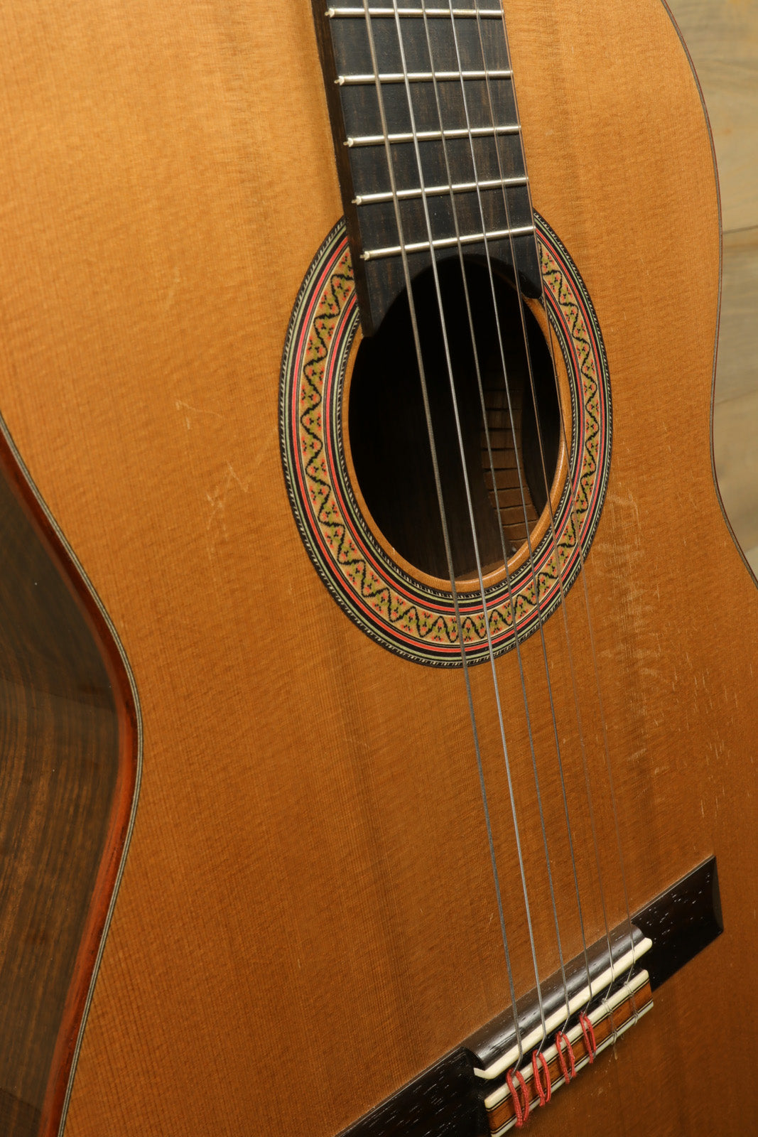 R. Thomas Rein Classical Concert Guitar in natural wood finish, front view showcasing intricate rosette