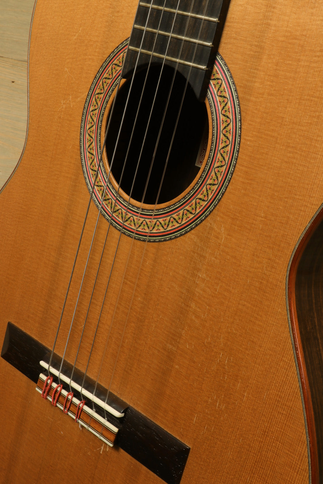 R. Thomas Rein Classical Concert Guitar with a natural finish, showcasing intricate rosette design, close-up view