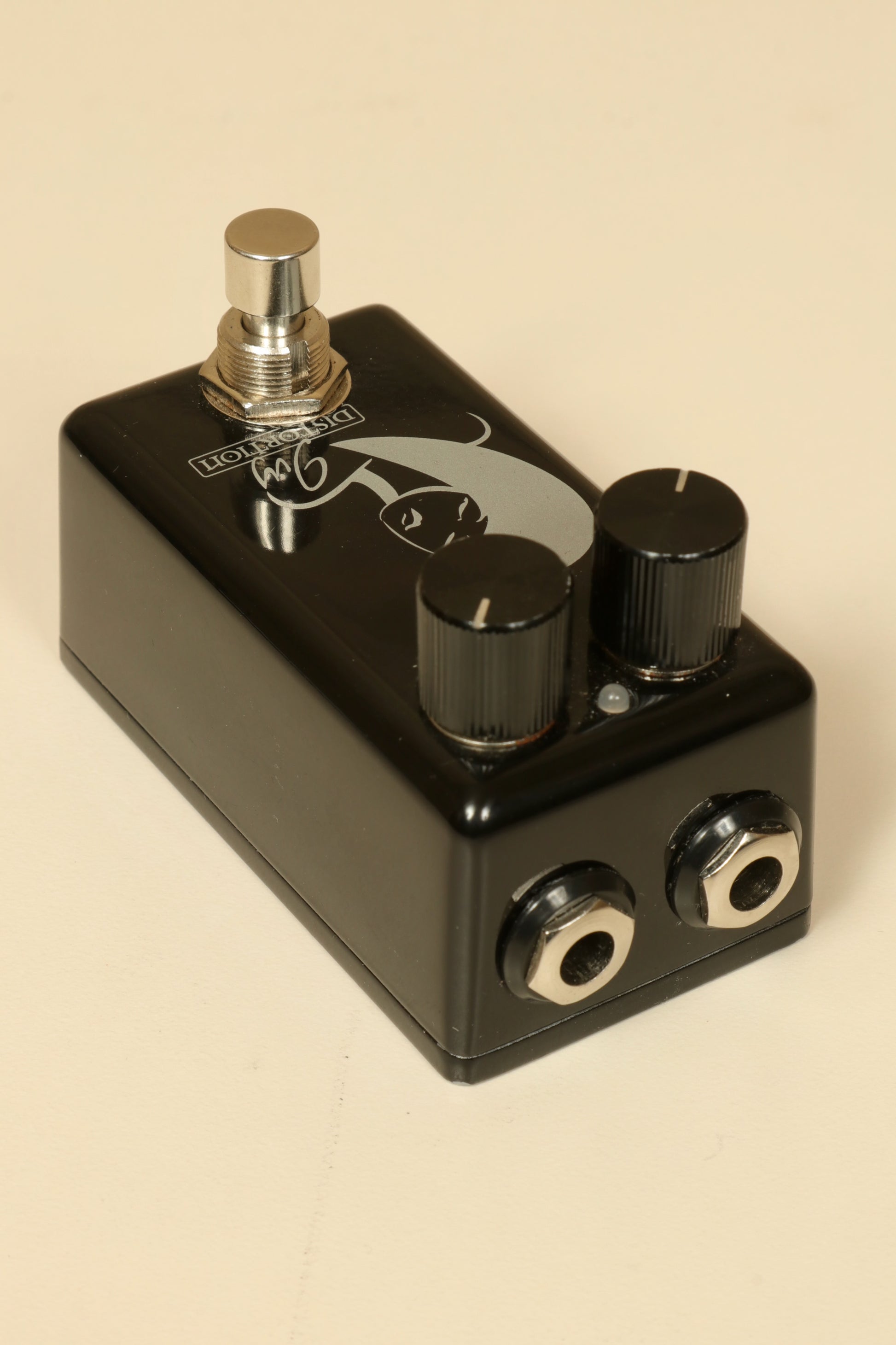 Red Witch Ivy Distortion used effects pedal in black with two knobs and input/output jacks