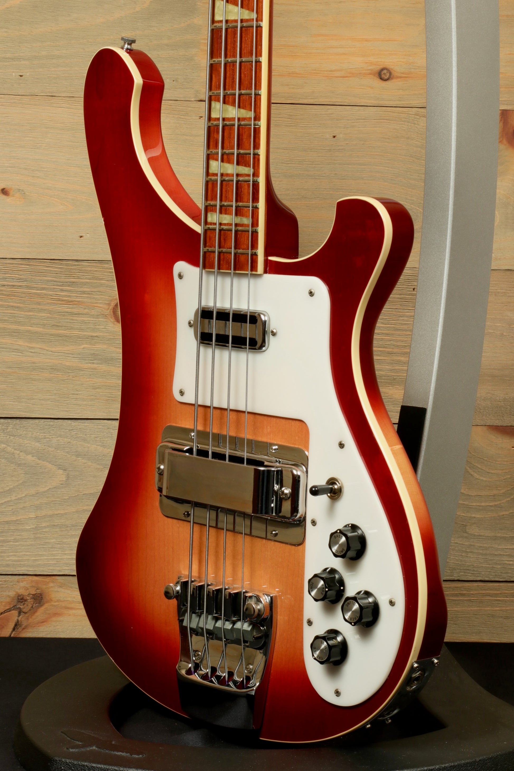 Rickenbacker 4001 bass guitars in sunburst finish, front view showcasing the body and control knobs