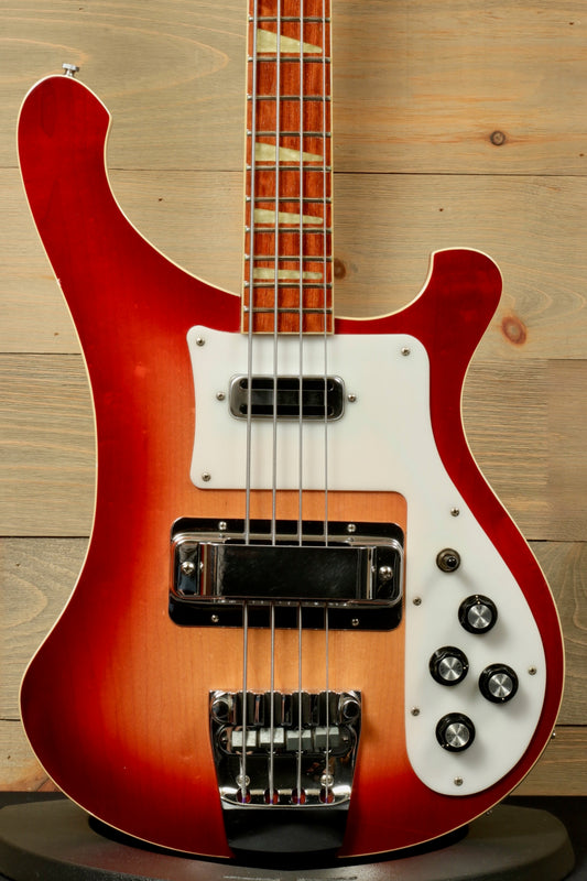 Rickenbacker 4001 bass guitars in flame red finish, front view showcasing body and controls