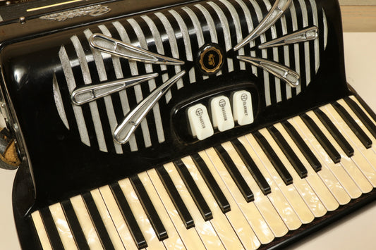 Rivoli Little Maestro Accordion in black with silver accents, front view showcasing keys and buttons