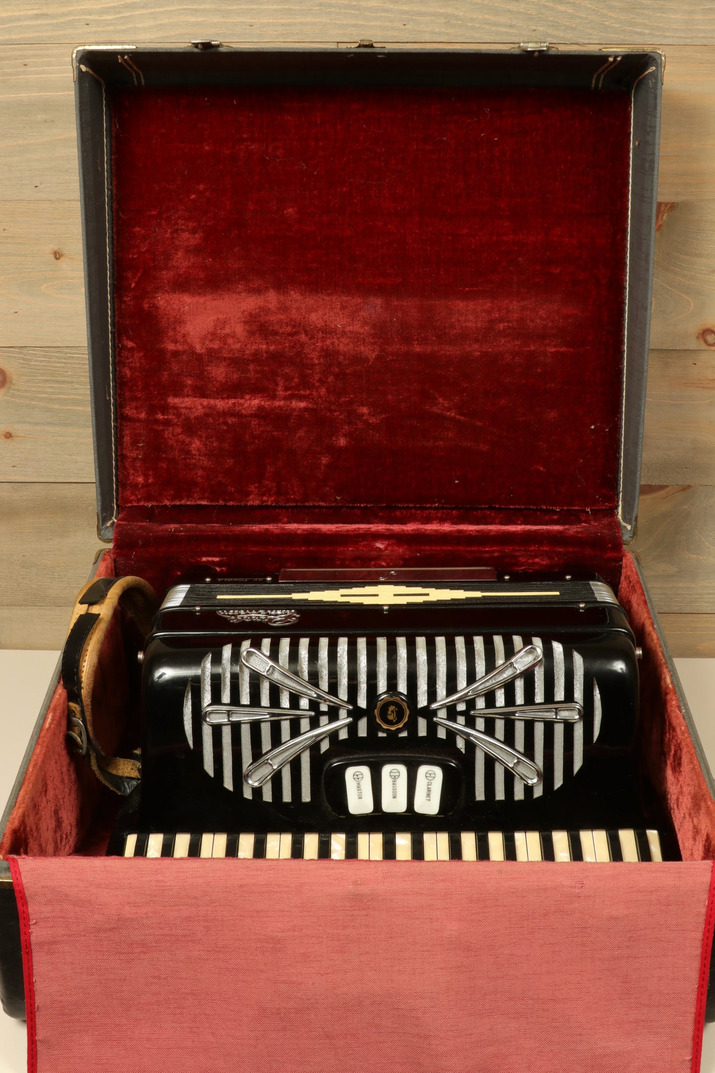 Rivoli Little Maestro Accordion in black and white, open view showcasing keys and decorative design