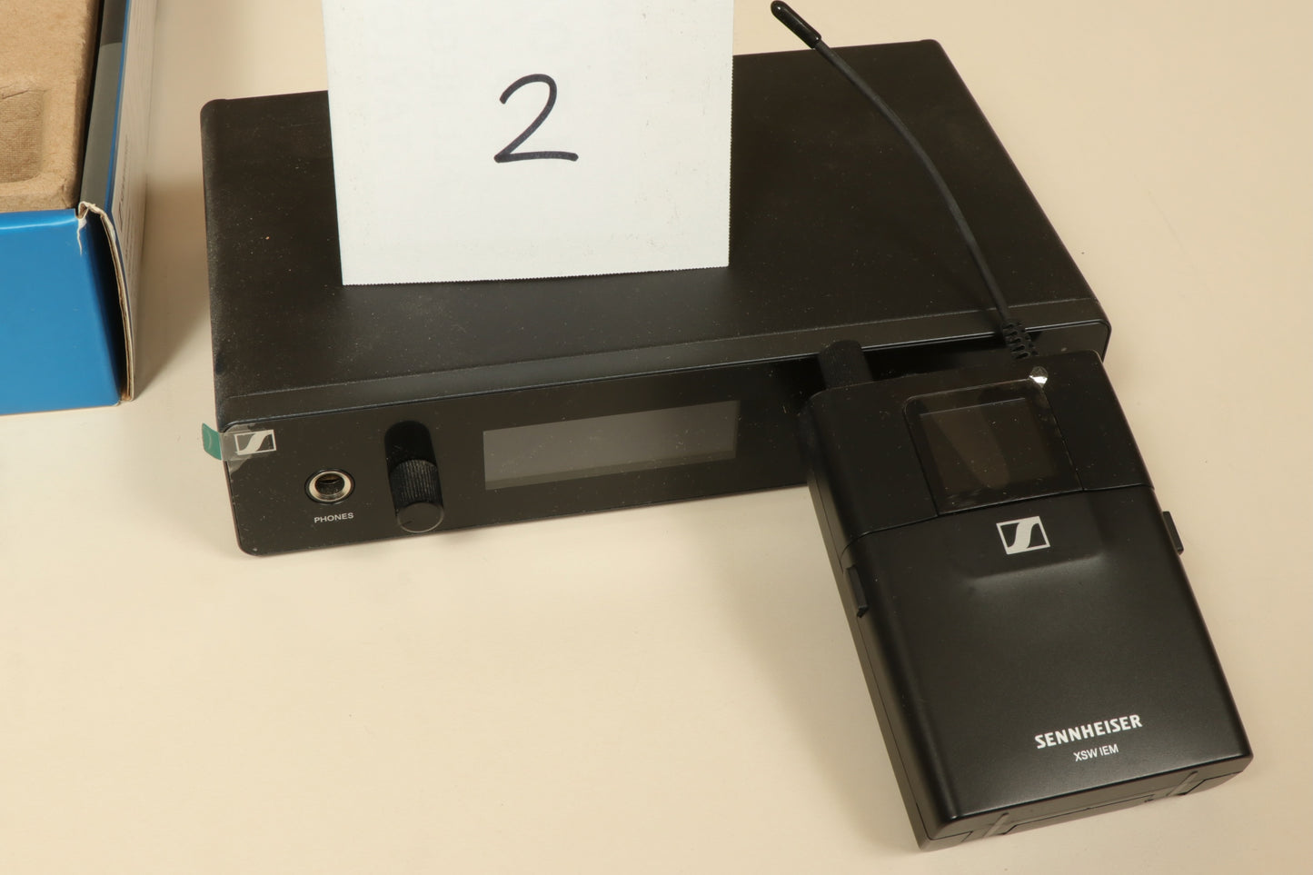 Sennheiser Wireless In Ear Monitors black receiver and transmitter unit, top view
