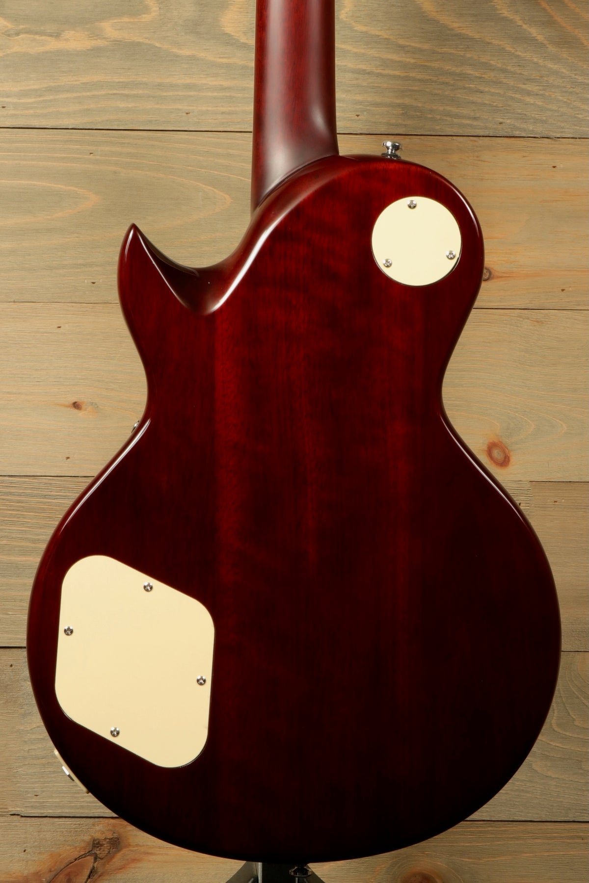 Sire Electric Guitar Goldtop with a rich mahogany back, showcasing smooth curves and a classic design