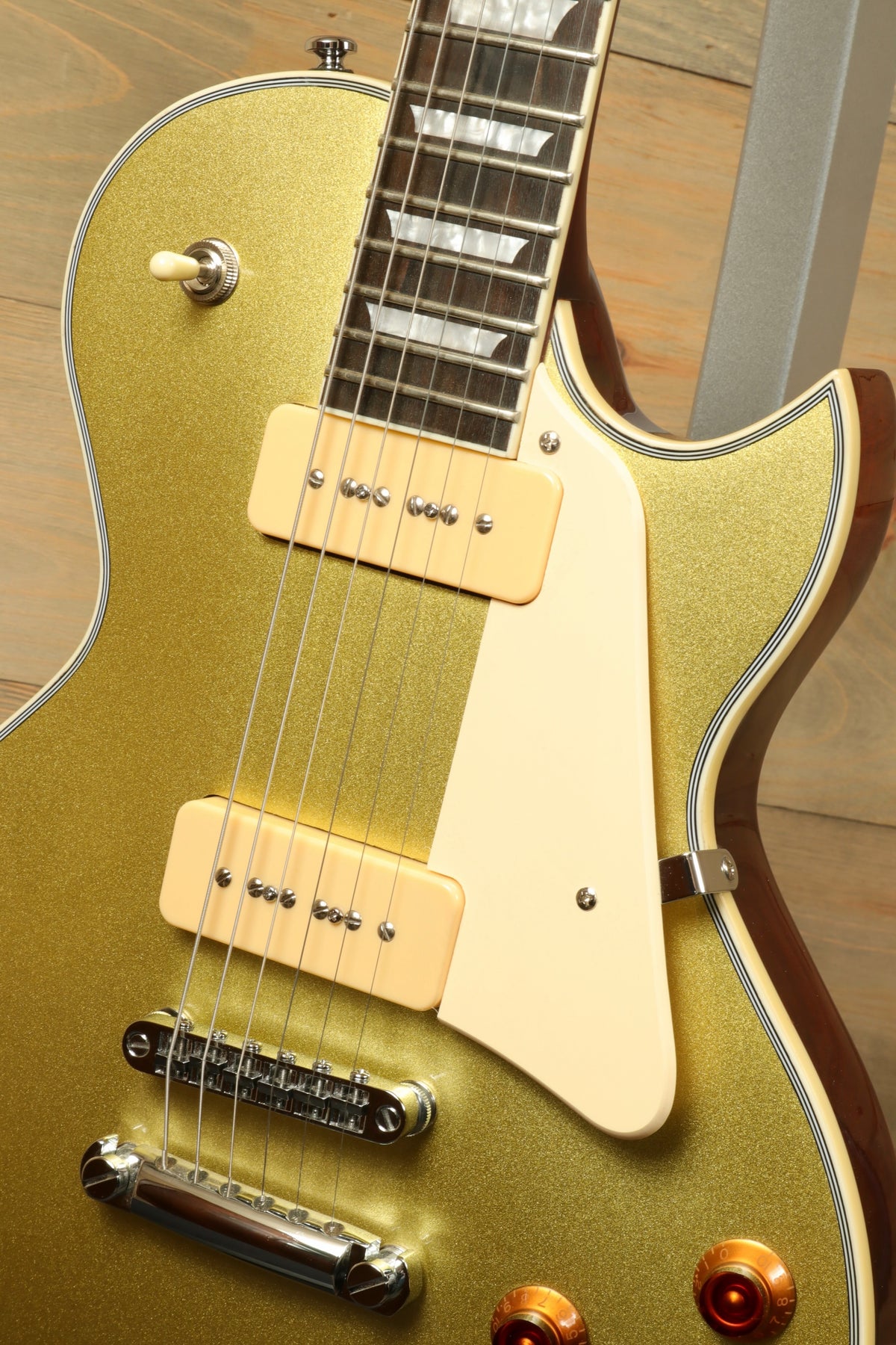 Sire Electric Guitar Goldtop, gold finish, front view showcasing pickups and hardware