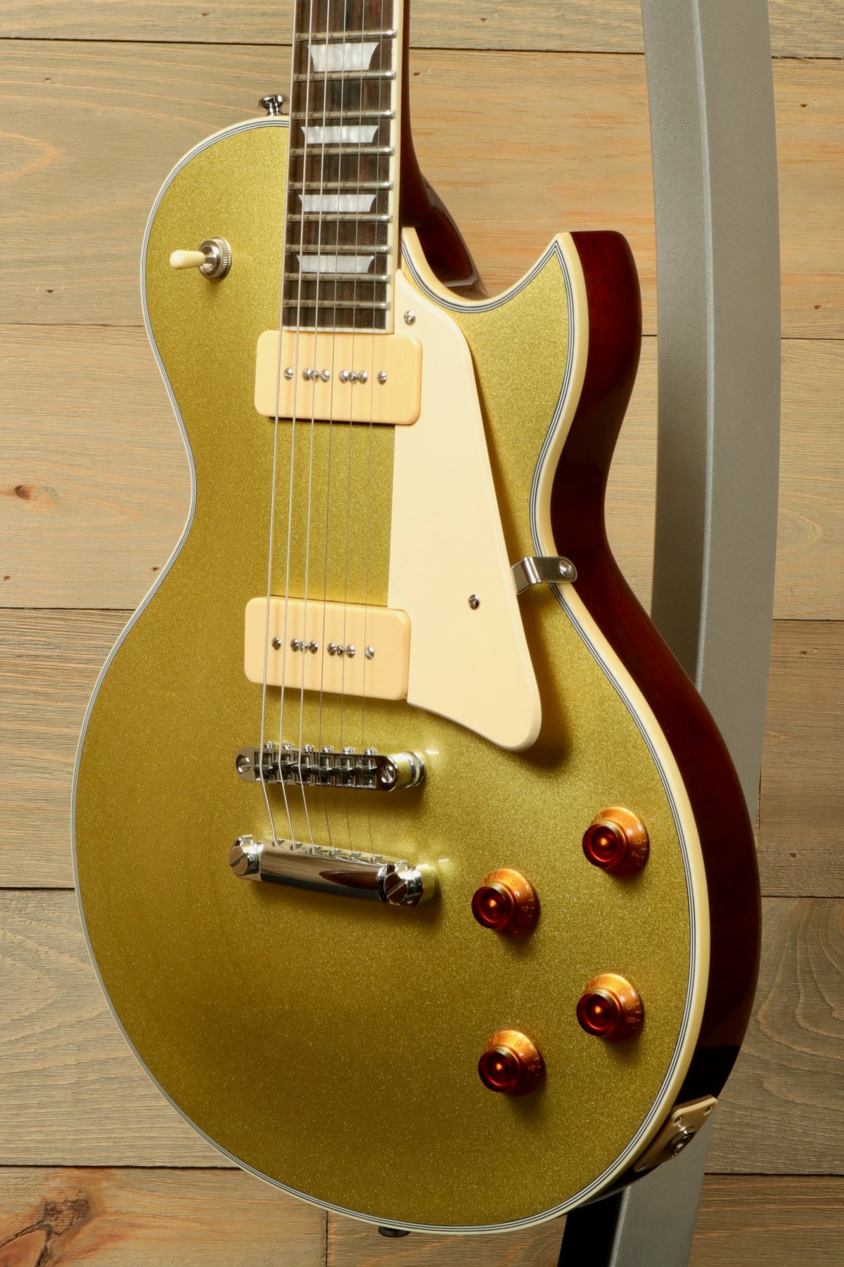 Sire Electric Guitar Goldtop with a gold finish, front view showcasing the stunning design and details