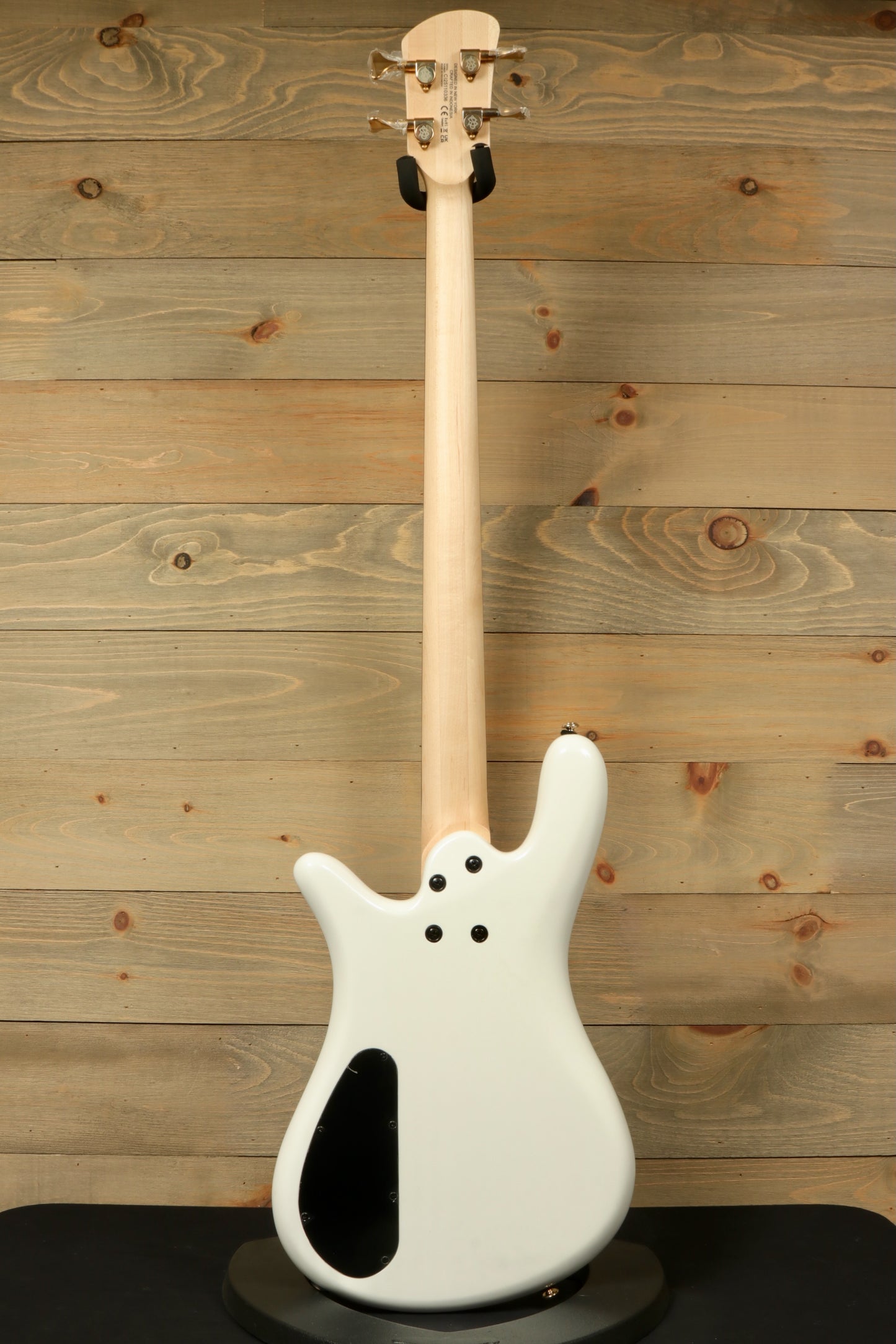 Back view of Spector ICON NS-2 bass guitar showcasing its sleek white finish and smooth contours