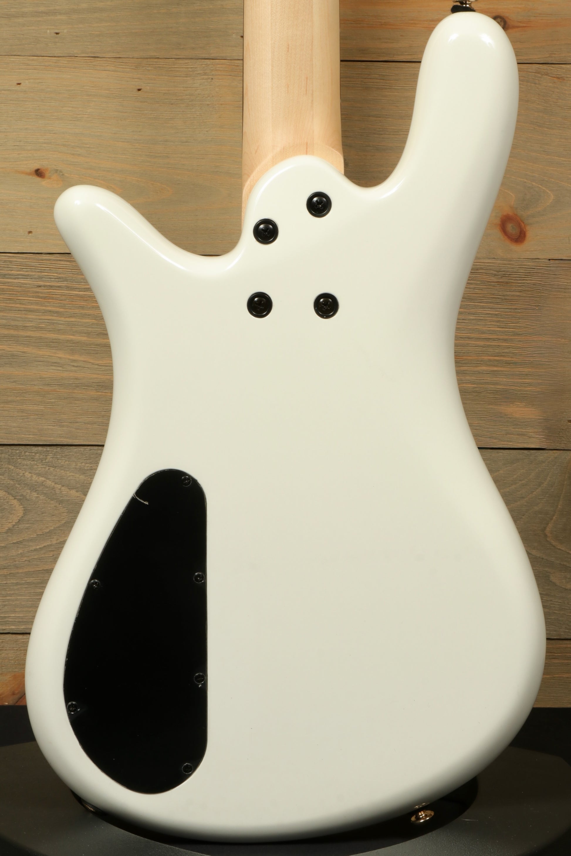 Back view of a white Spector ICON NS-2 bass guitar featuring a smooth finish and stylish contours