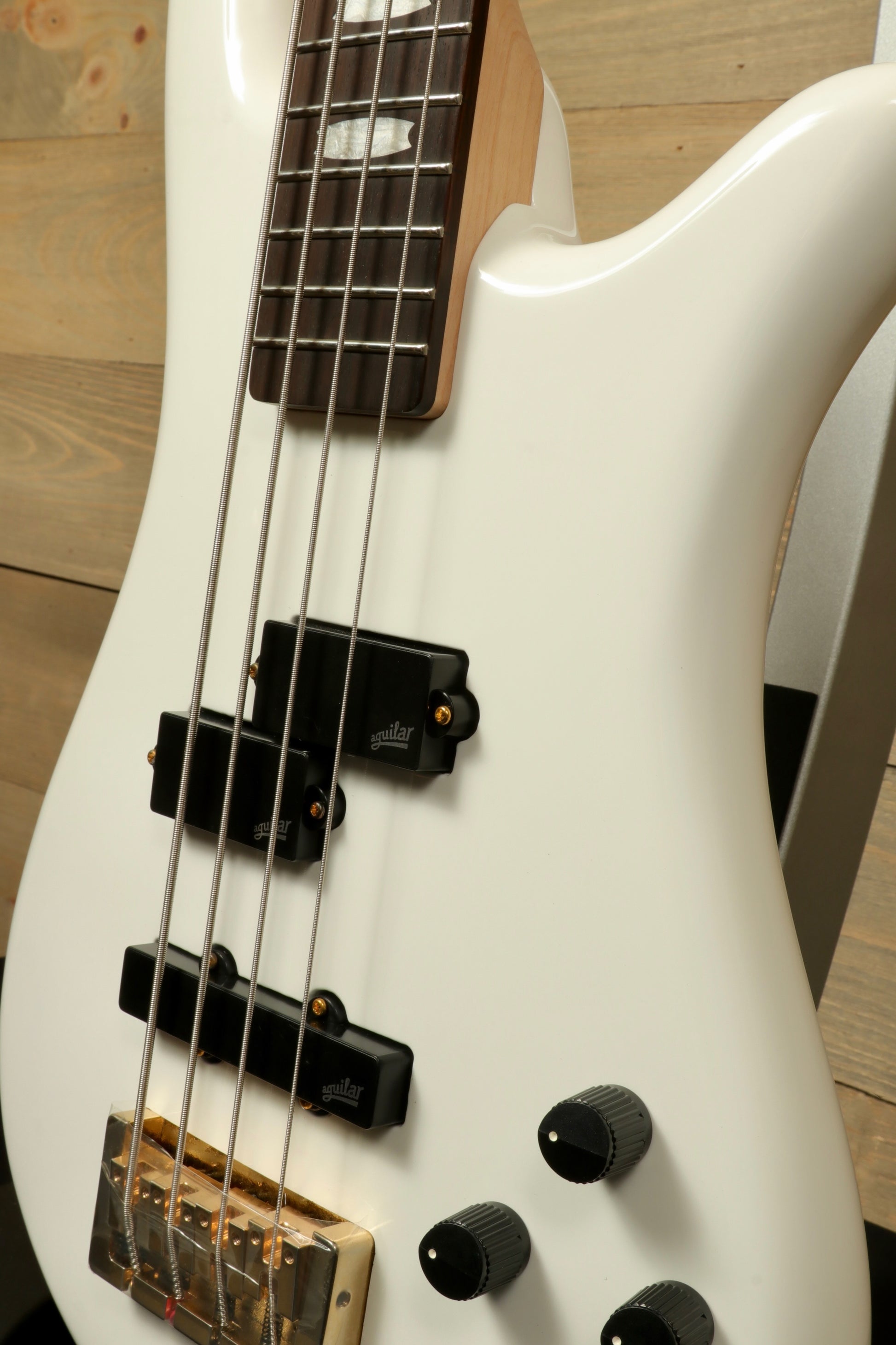 Spector ICON NS-2 bass guitar with a sleek white finish and black pickup controls