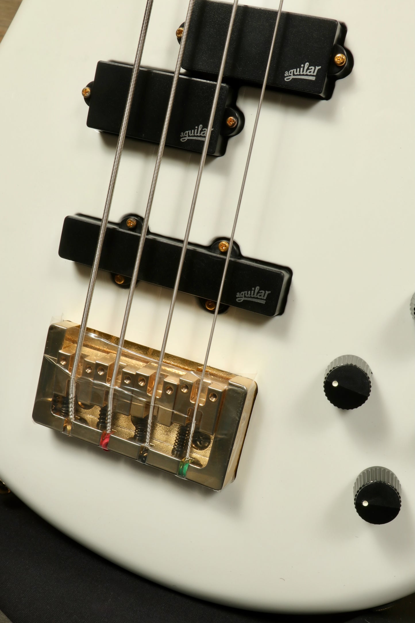 Close-up of Spector ICON NS-2 bass guitar with detailed bridge and pickups highlighting craftsmanship