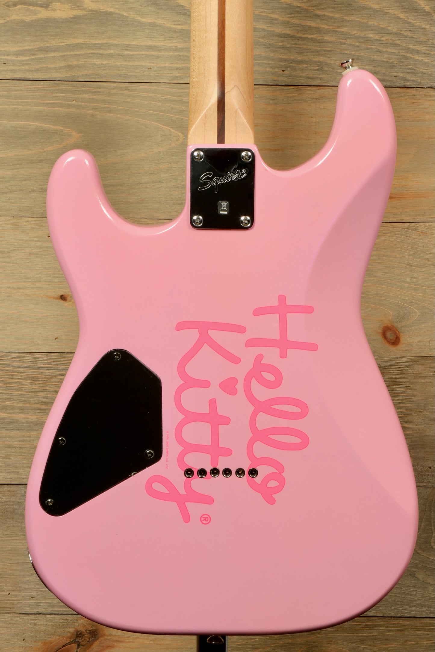 2006 Squier Hello Kitty Stratocaster electric guitar in pink with signature logo on back