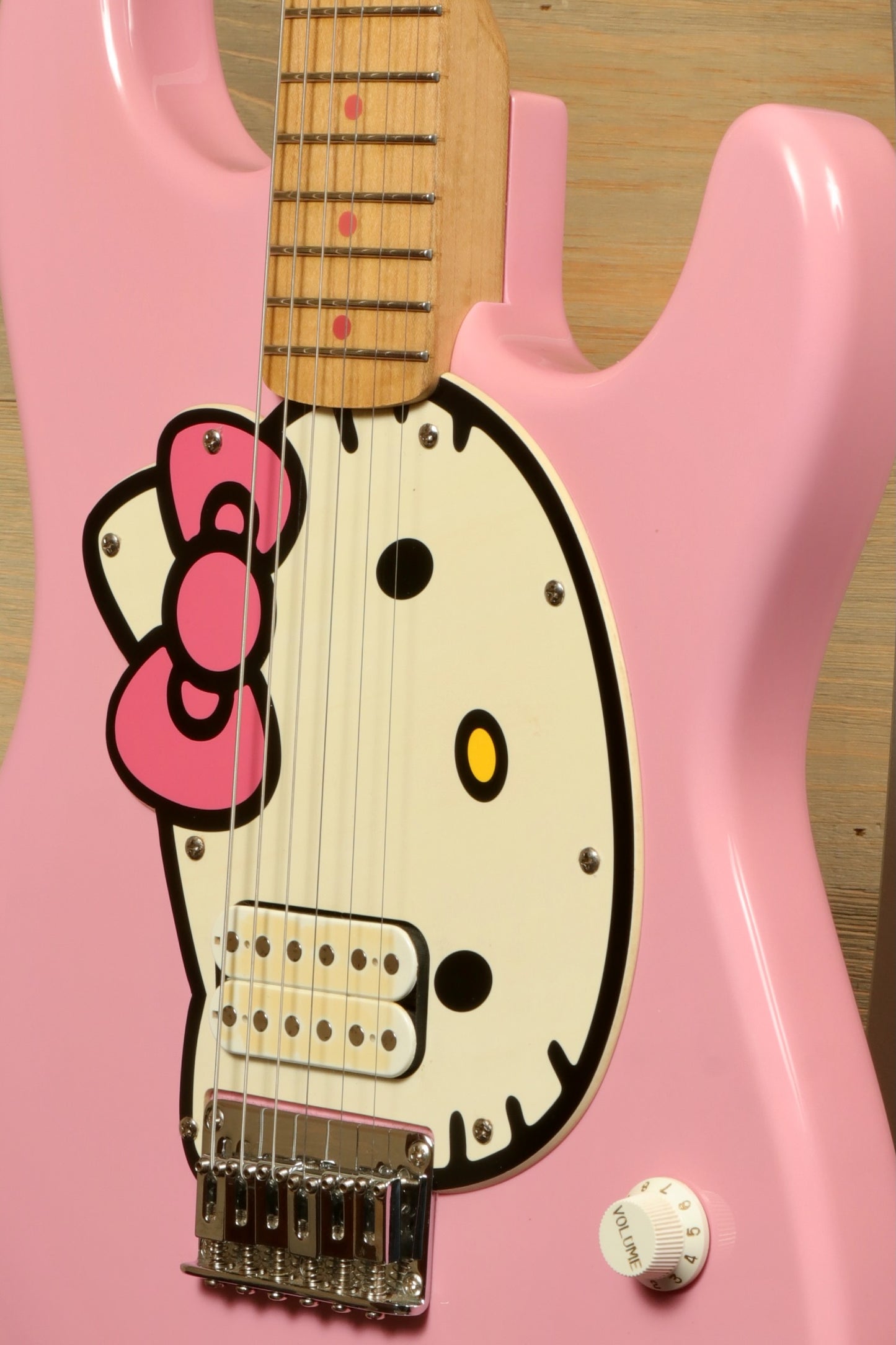 Squier 2006 Squier Hello Kitty Stratocaster in pink with Hello Kitty graphic, front view