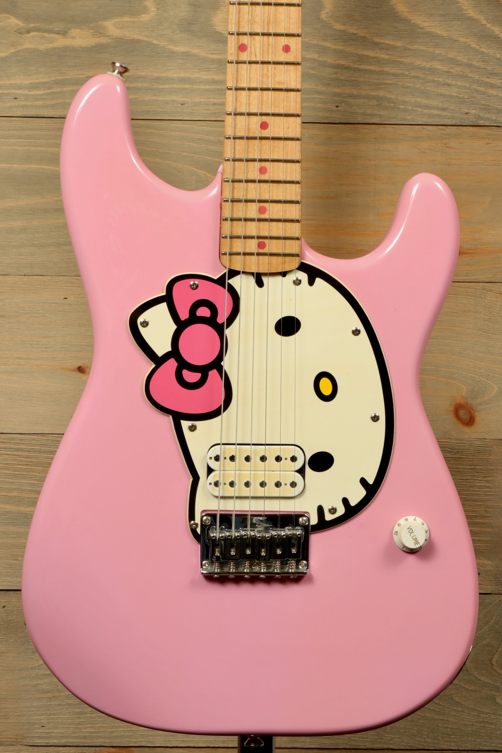 2006 Squier Hello Kitty Stratocaster in pink with Hello Kitty graphic, front view