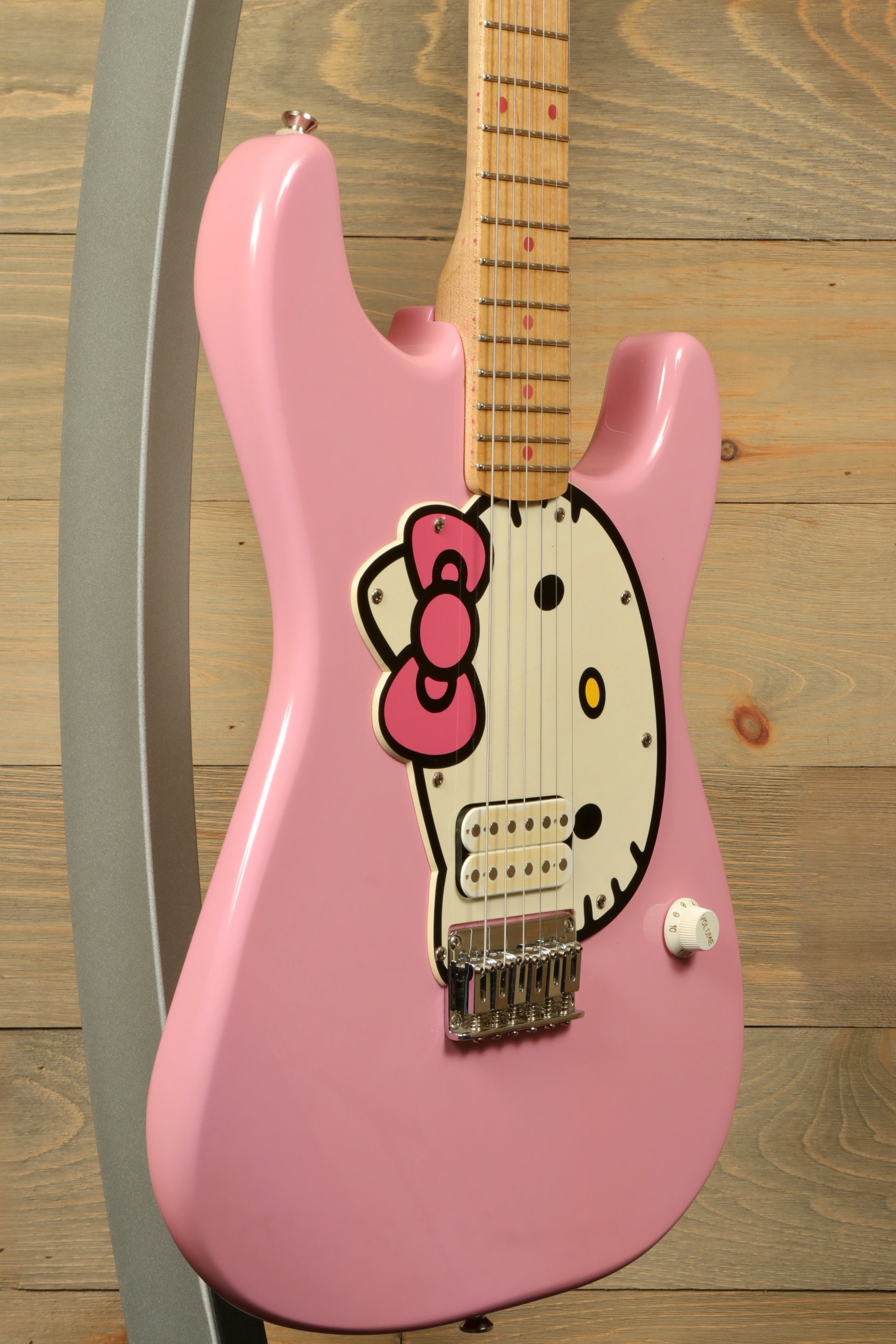2006 Squier Hello Kitty Stratocaster in pink with Hello Kitty graphic, side view