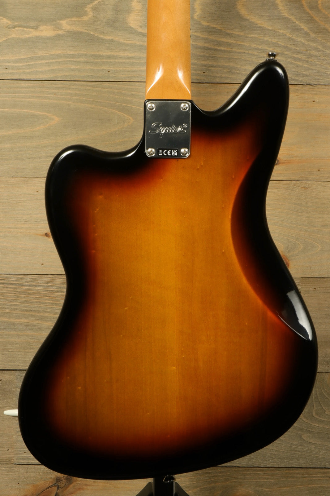Squier Classic Vibe 70s Jaguar sunburst finish, back view showcasing the smooth contour