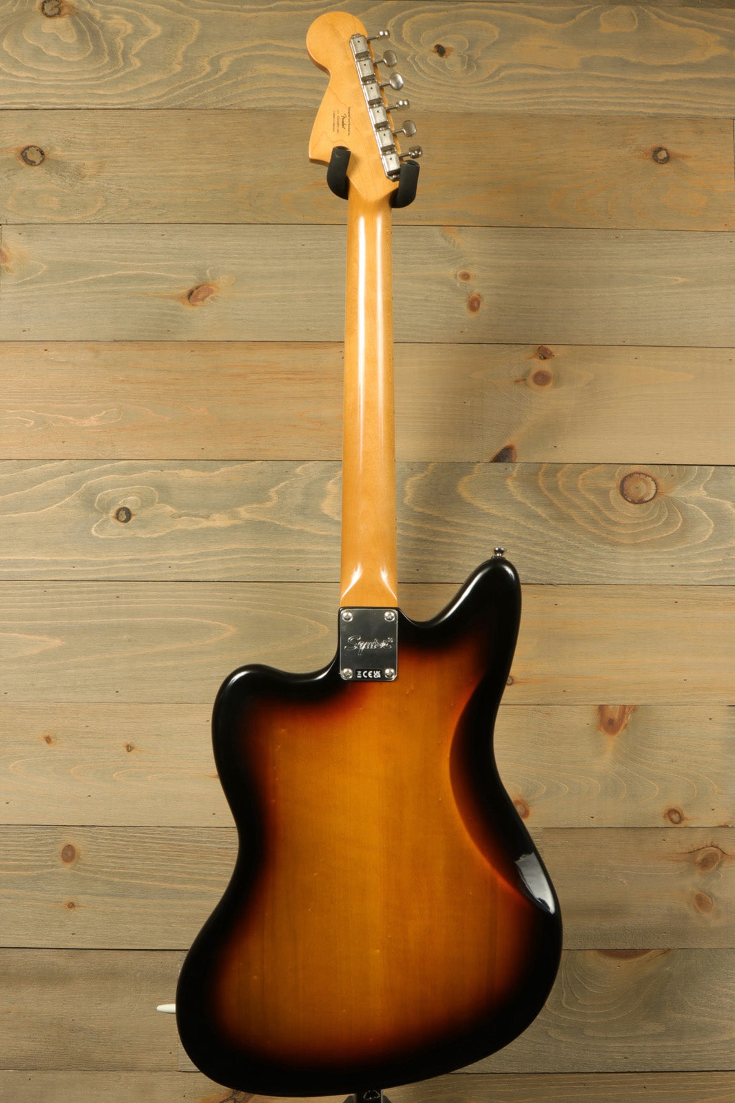 Squier Classic Vibe 70s Jaguar sunburst finish, back view highlighting detailed neck and body contour