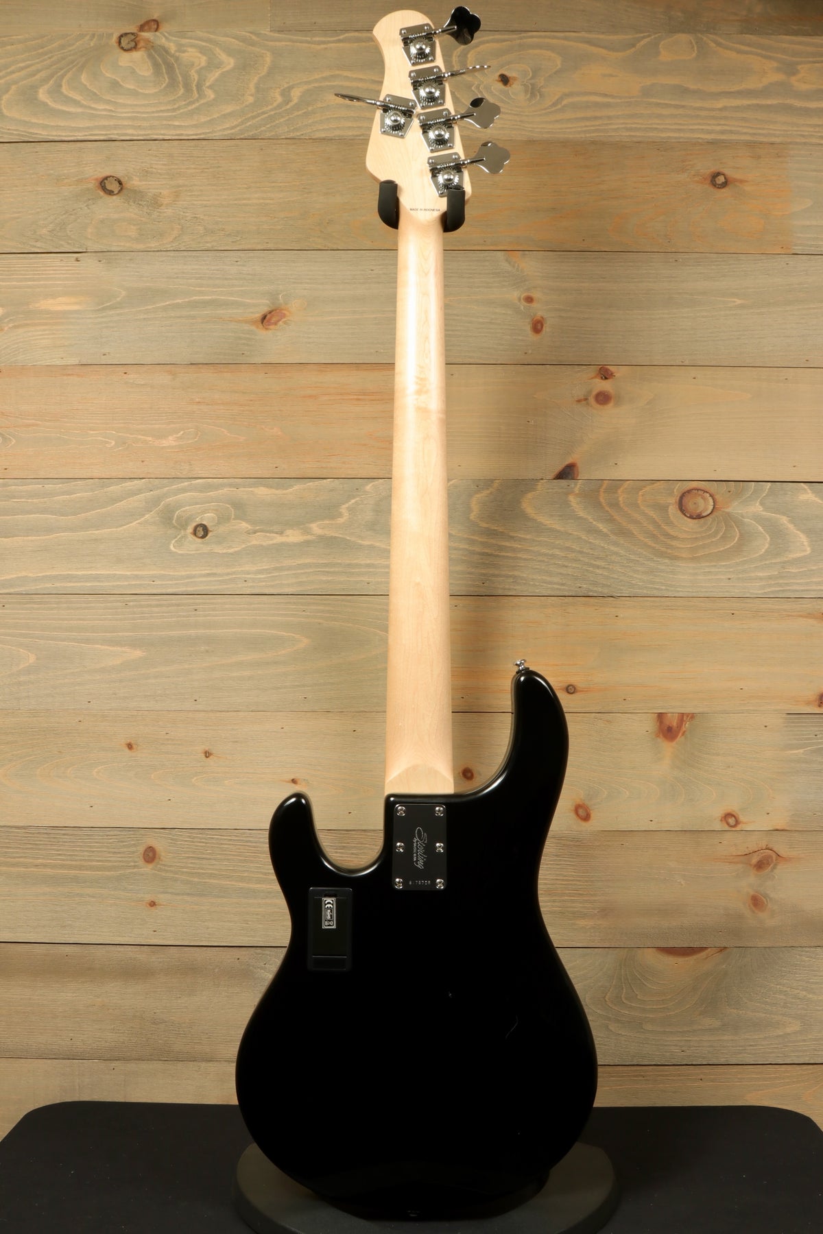 Sterling by Music Man black used active 5 string bass, back view showcasing tuning pegs