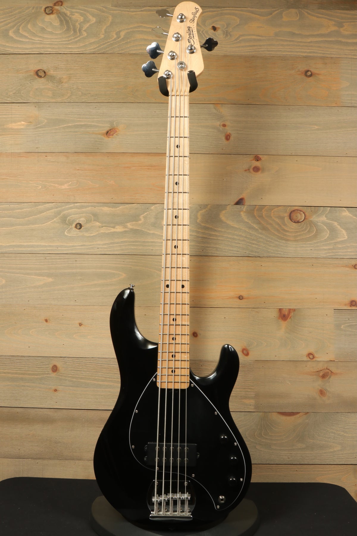 Sterling by Music Man black used active 5 string bass guitar, front view with a maple neck